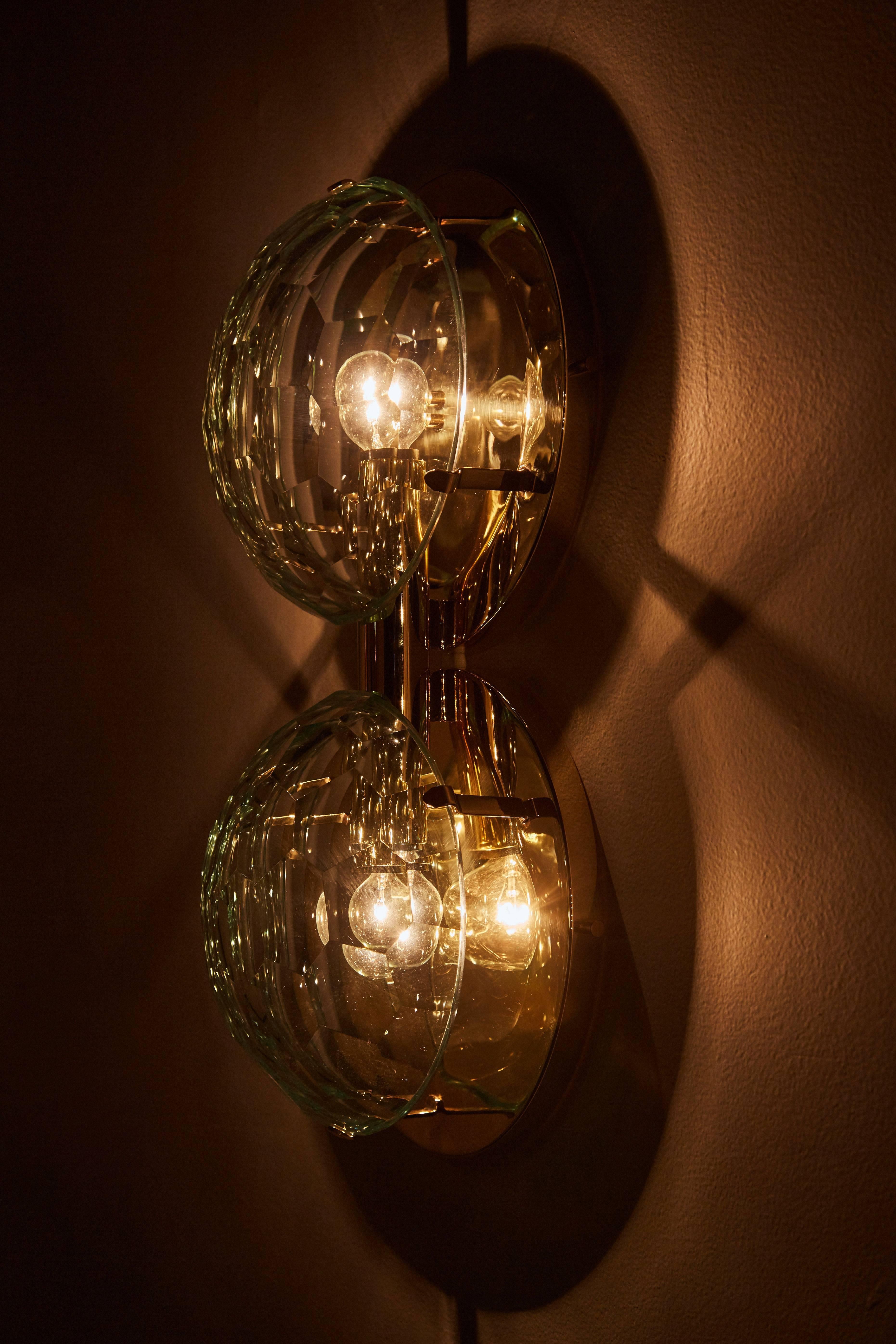 Mid-Century Modern Pair of Brass and Multifaceted Glass Sconces