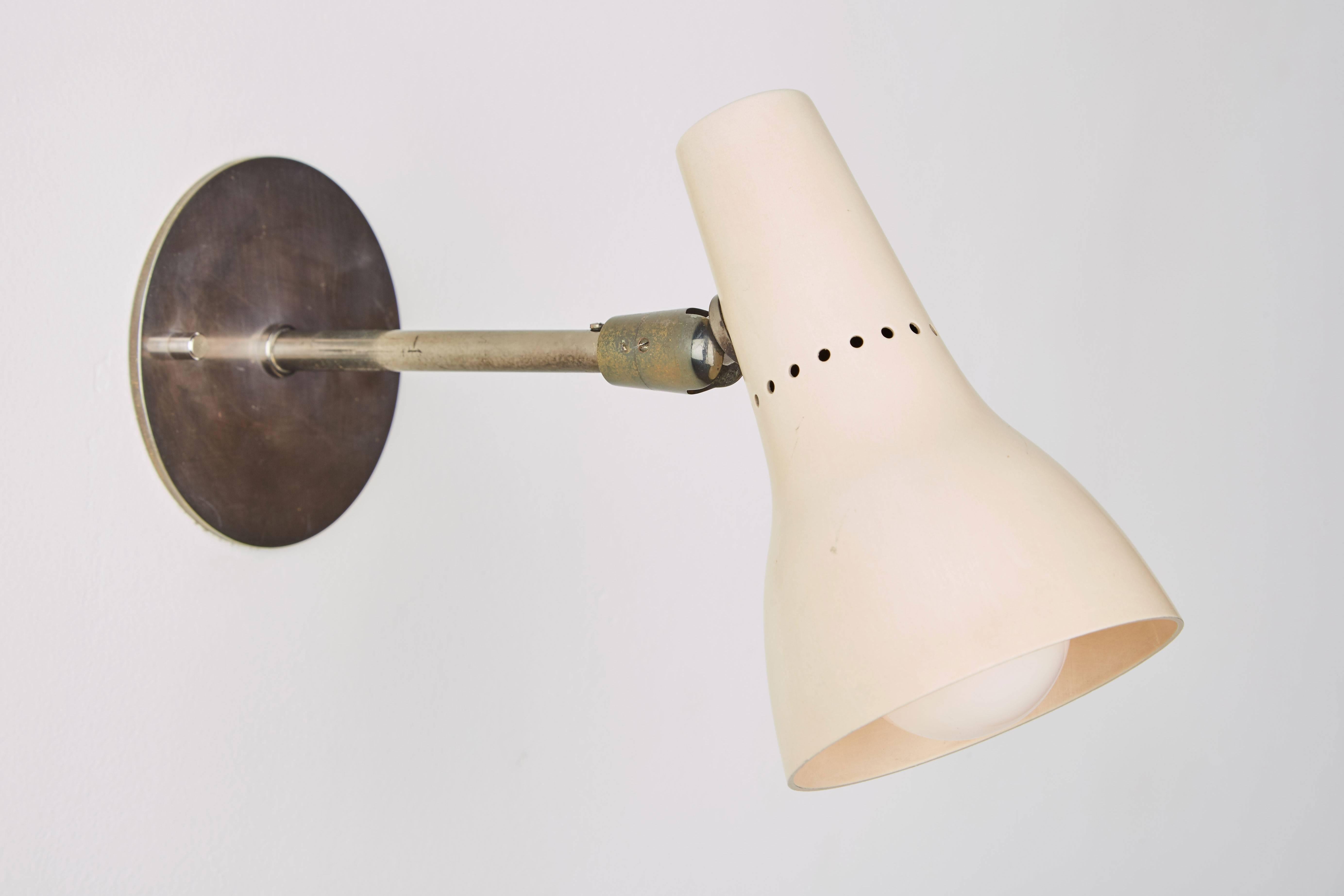 Mid-Century Modern Pair of Articulating Sconces by Giuseppe Ostuni