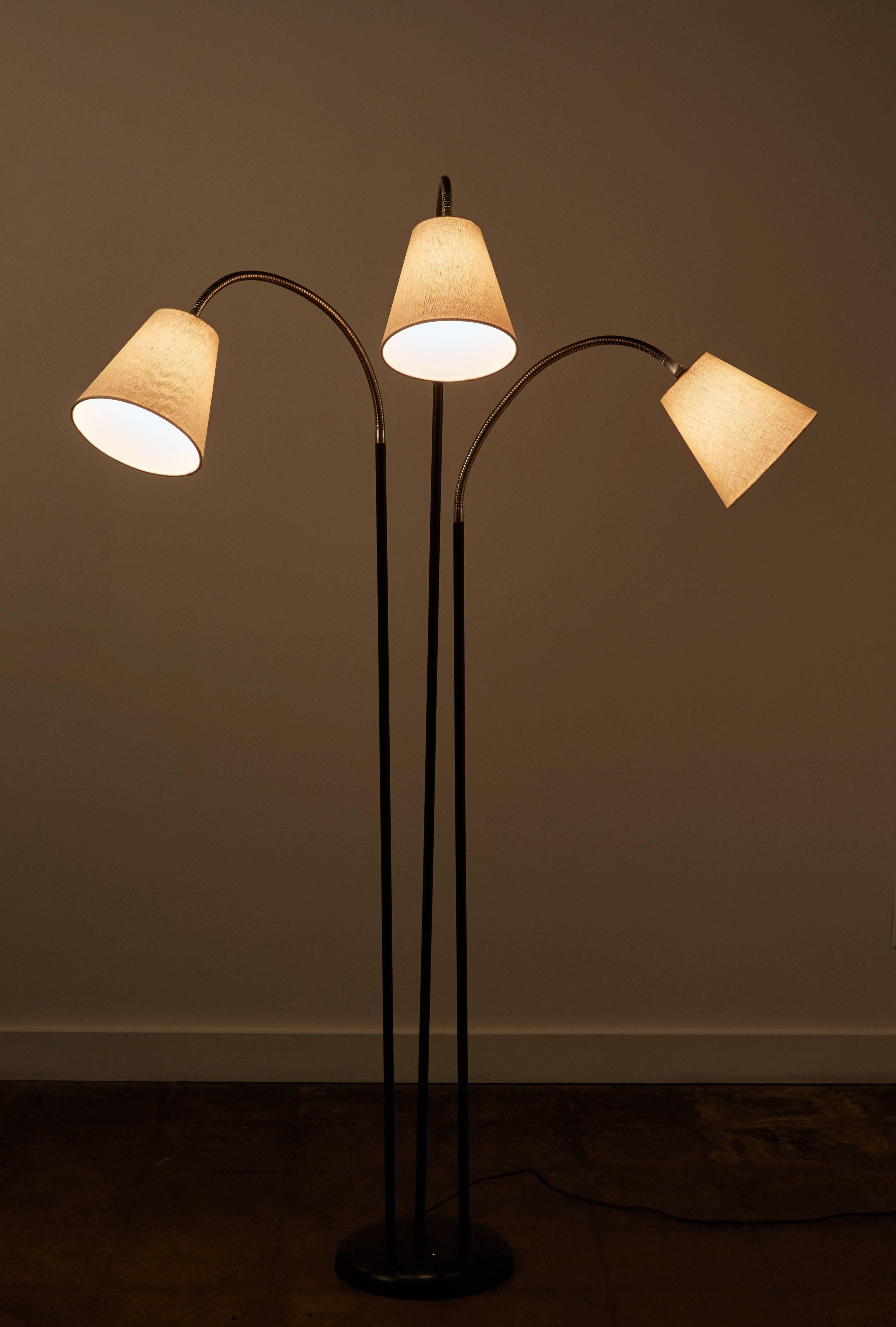Floor lamp with three articulating arms by David Wurster designed in the US, circa 1950s. New custom fabricated linen shades. Each shade articulates in various positions by nickel plated brass gooseneck stems. Rewired. Takes three E26 75w maximum