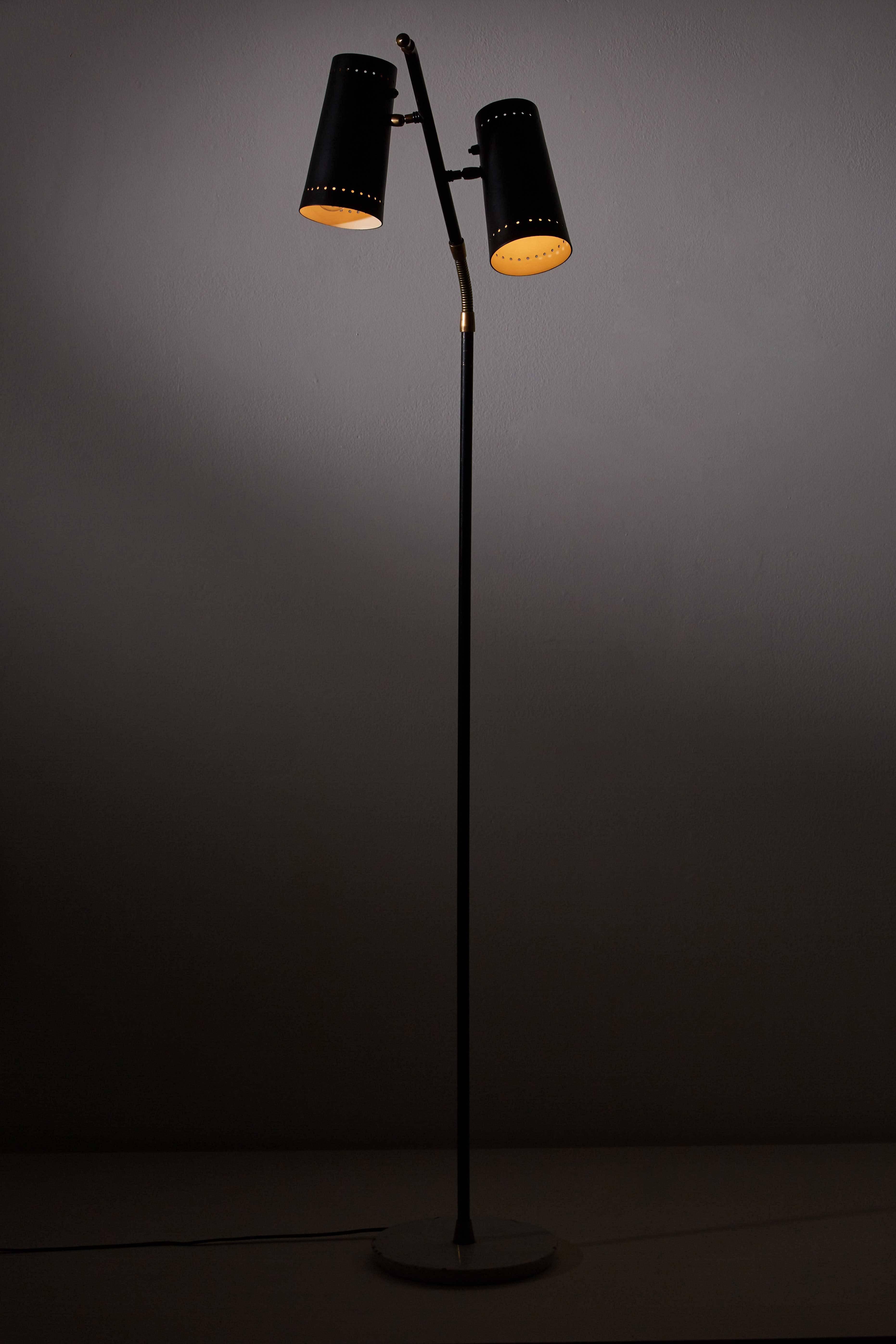 Floor lamp with two pivoting shades, adjustable brass goose neck arms and marble base designed by Stilux in Italy, circa 1950s. Original cord. Takes two E27 75w maximum bulbs.