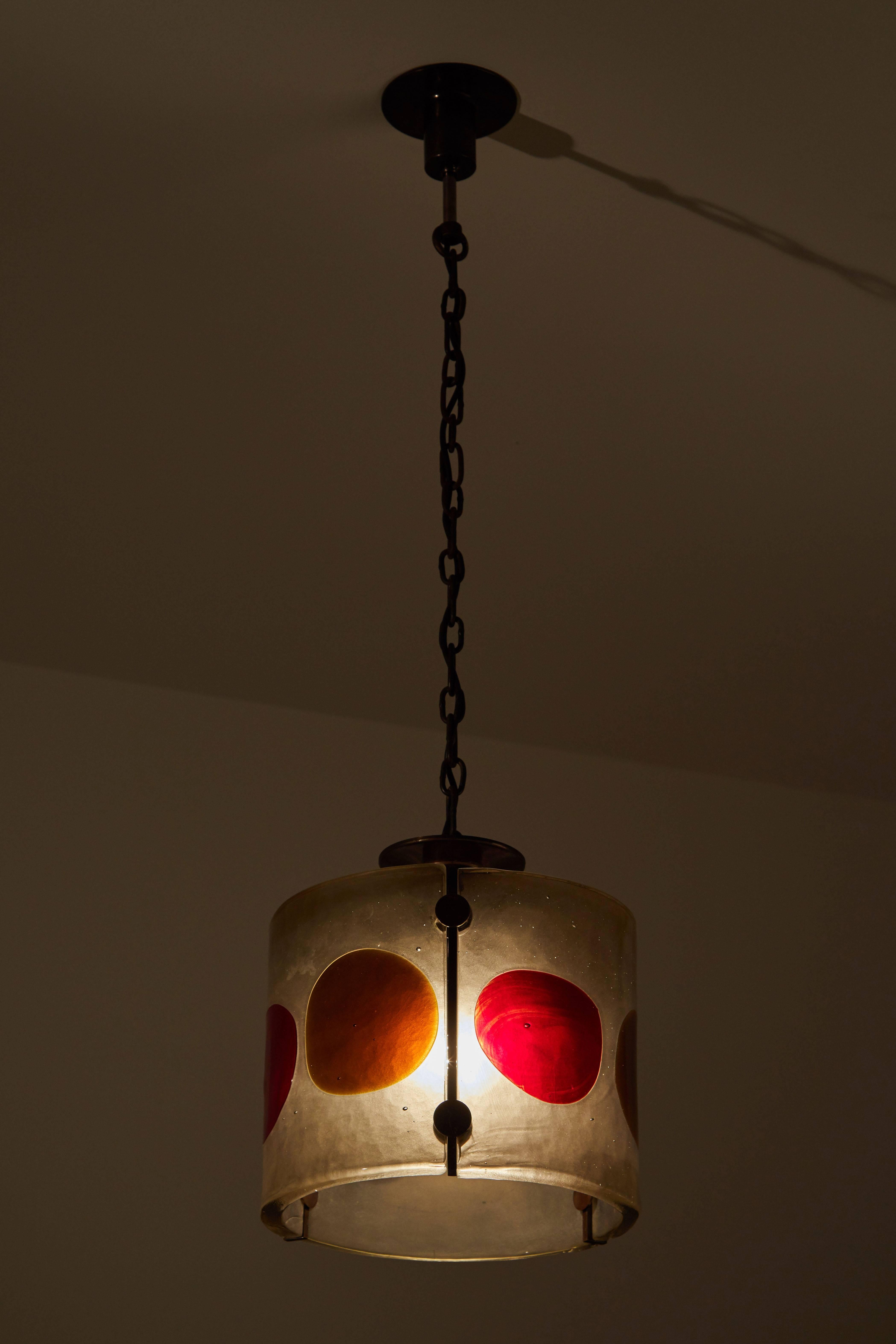 Thick textured hand cast glass suspension light designed by Venini in Italy, circa 1950s. Original bronze hardware and chain, custom canopy, wired for US junction boxes. Takes one E27 100w maximum bulb.