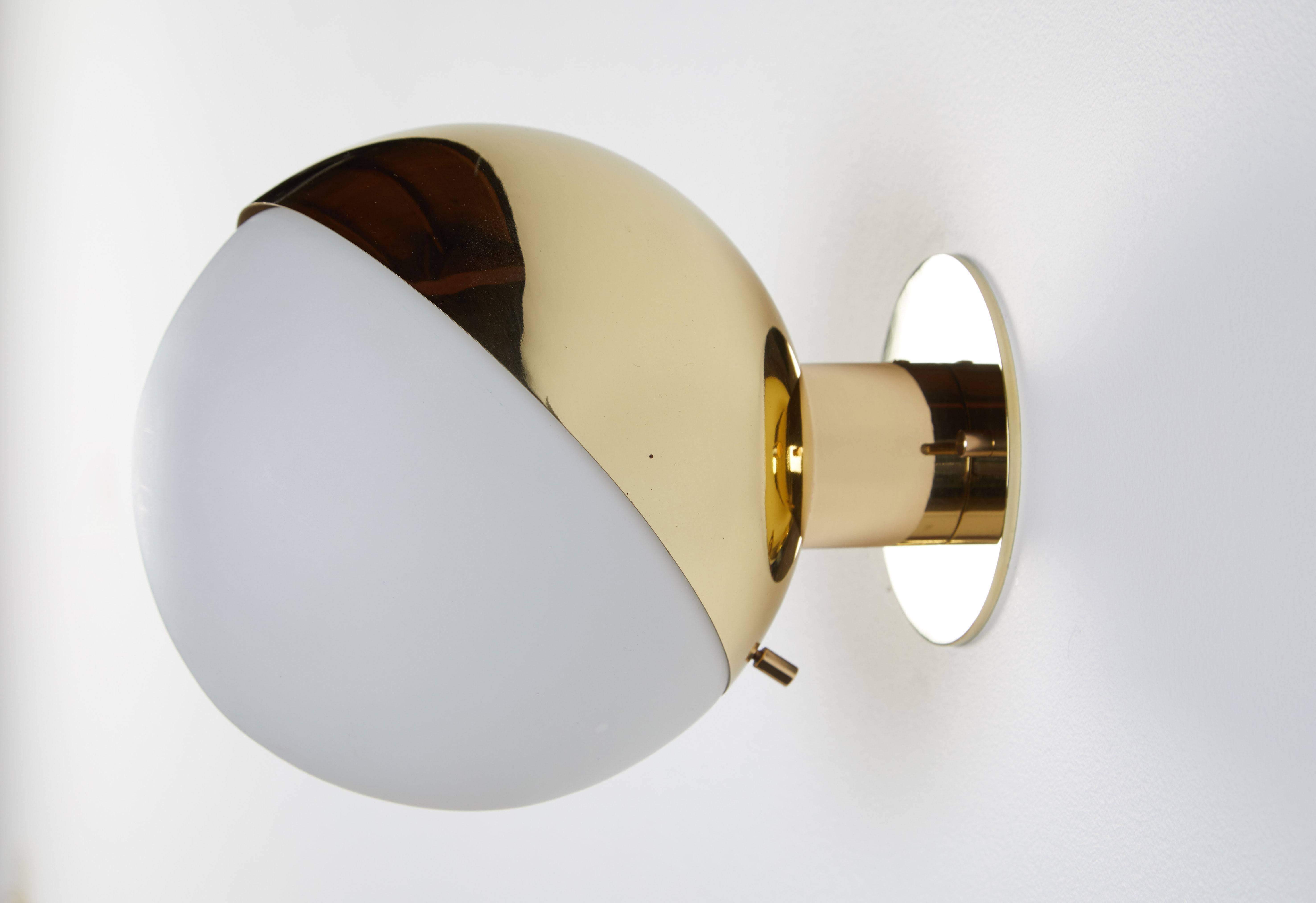 Pair of Brass and Opaline Glass Sconces by Stilnovo In Excellent Condition In Los Angeles, CA