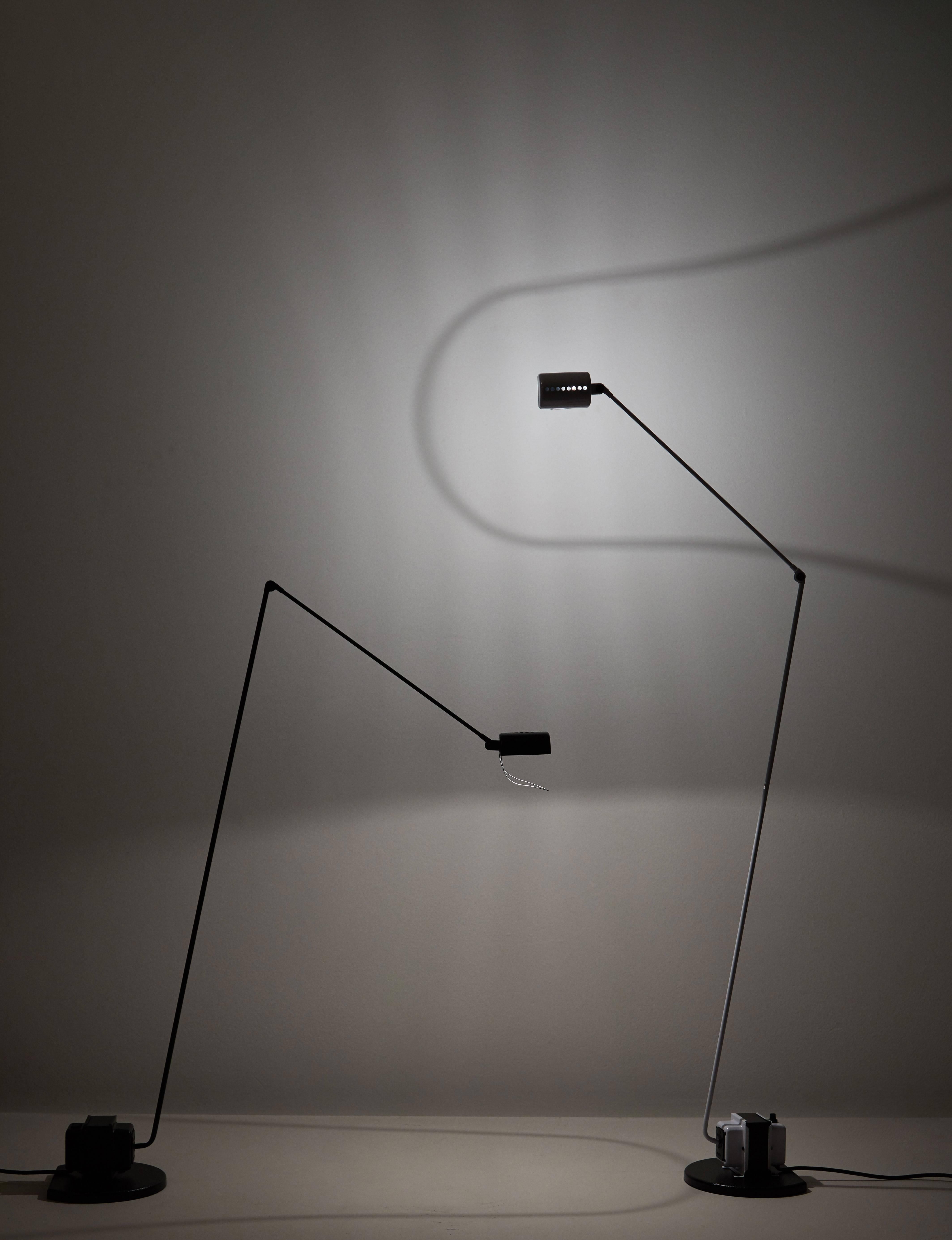 Daphine Terra floor lamp, originally designed by Tommaso Cimini in Italy, 1972. Composed of a metal frame with an articulated arm and diffuser which pivots 360° and and adjustable shade. Takes one G9 halogen bulb or LED 8w bulb. On/off  floor
