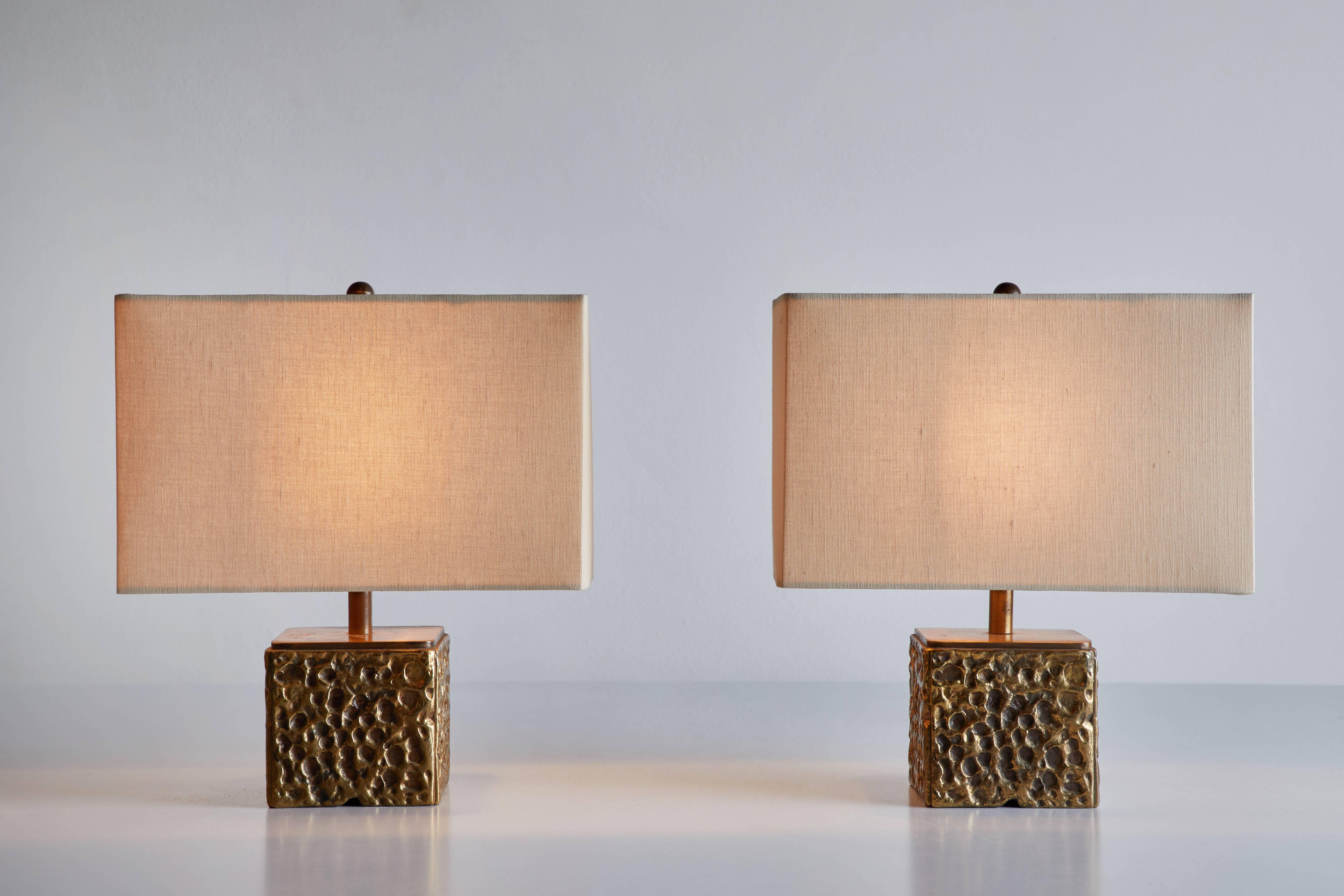 Pair of petite brass table Lamps by Luciani Frigerio produced for Frigerio in Italy, circa 1970s. Custom silk shades included. Original cords. Each light takes one E27 75w maximum bulb.