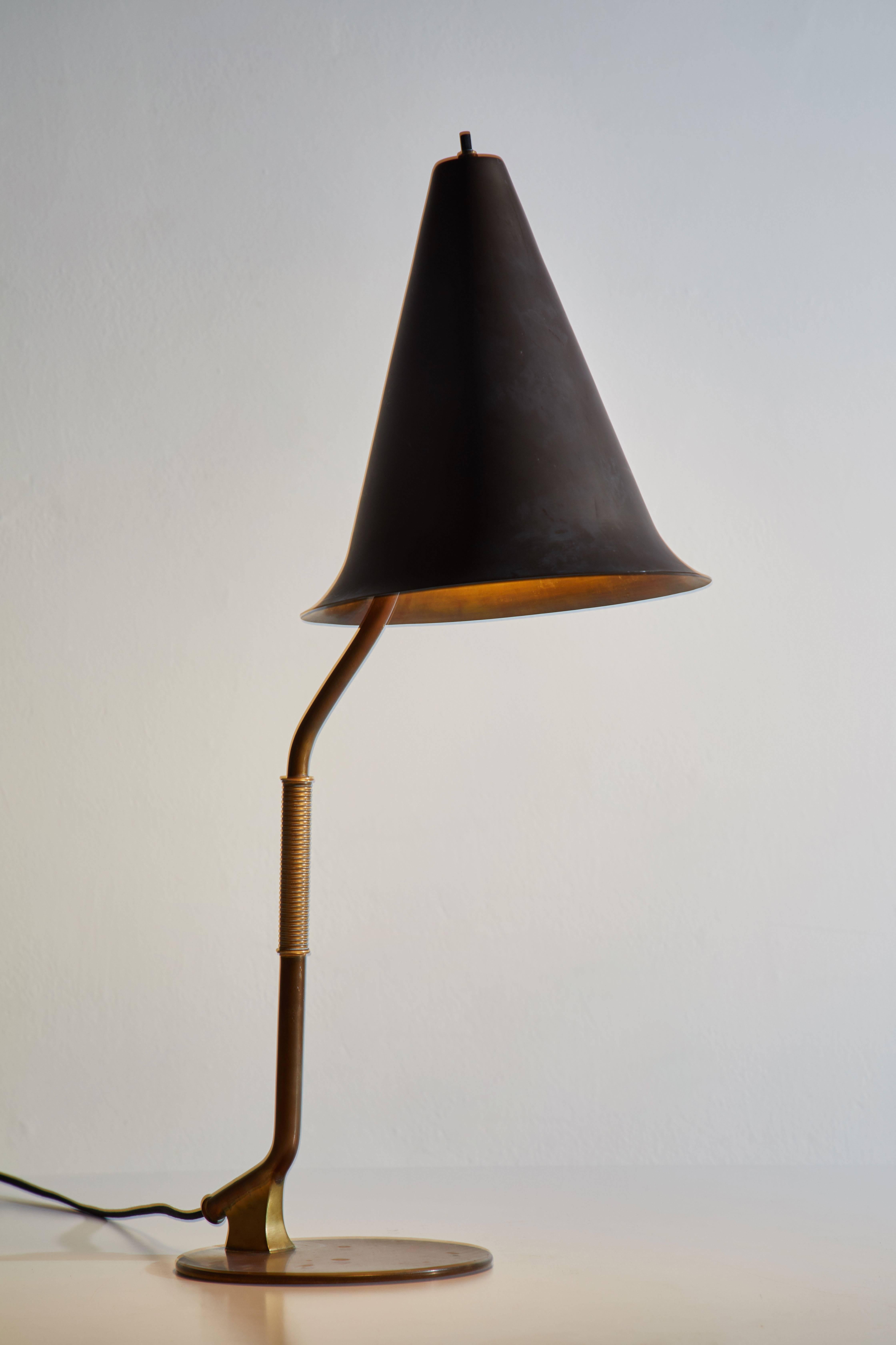 Rare and important table lamp designed in Sweden, circa 1940s. Rewired with black French twist cord. Beautifully patinated brass. Retains original impressed stamp Made in Sweden to base of lamp. Takes one E27 75w maximum bulb.