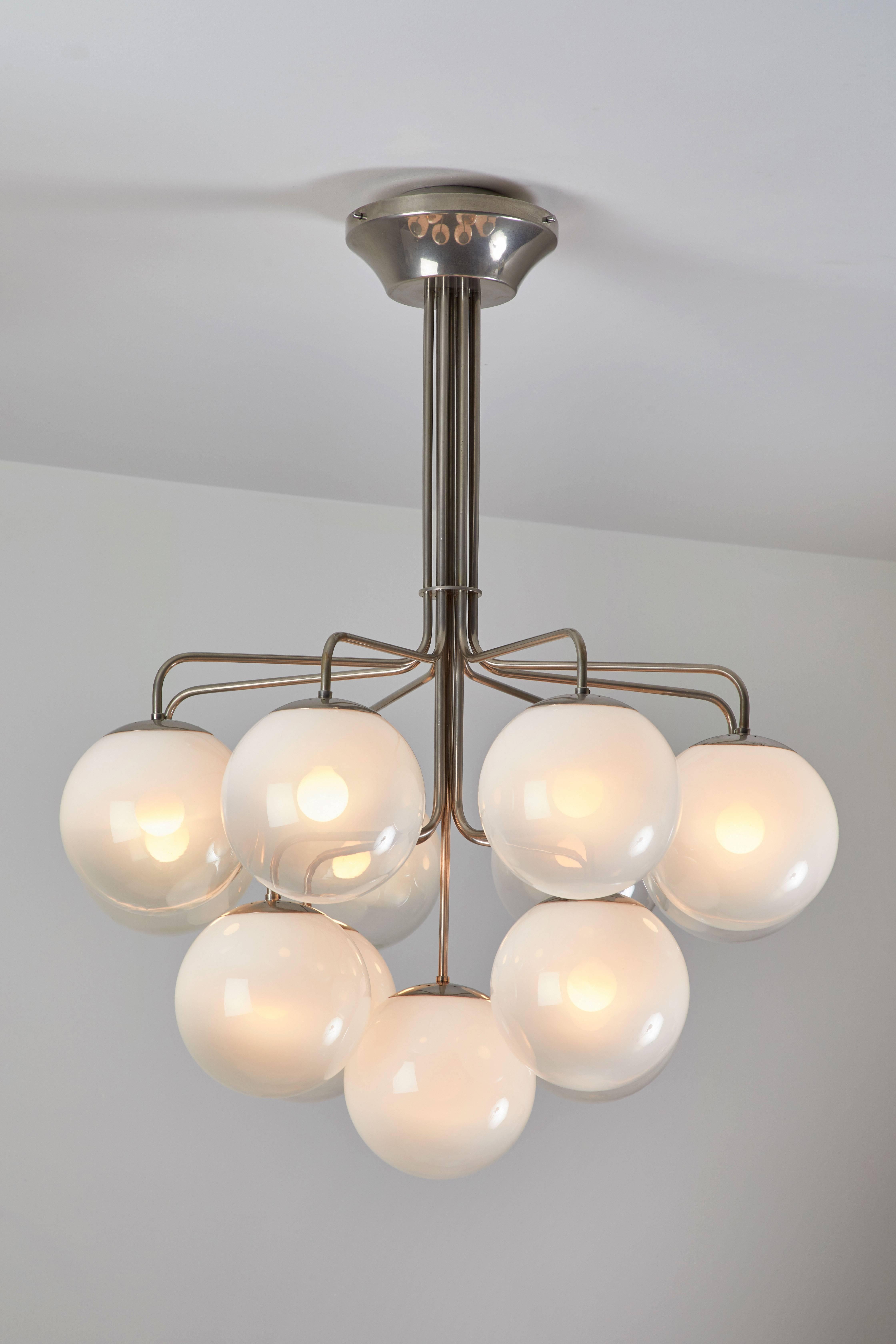 Thirteen globe chandelier by Vico Magistretti designed in Italy, circa 1960s. Nickel-plated brass and aluminium. Handblown Murano glass globes. Wired for US junction boxes. Each globe takes one E14 25w maximum bulb.