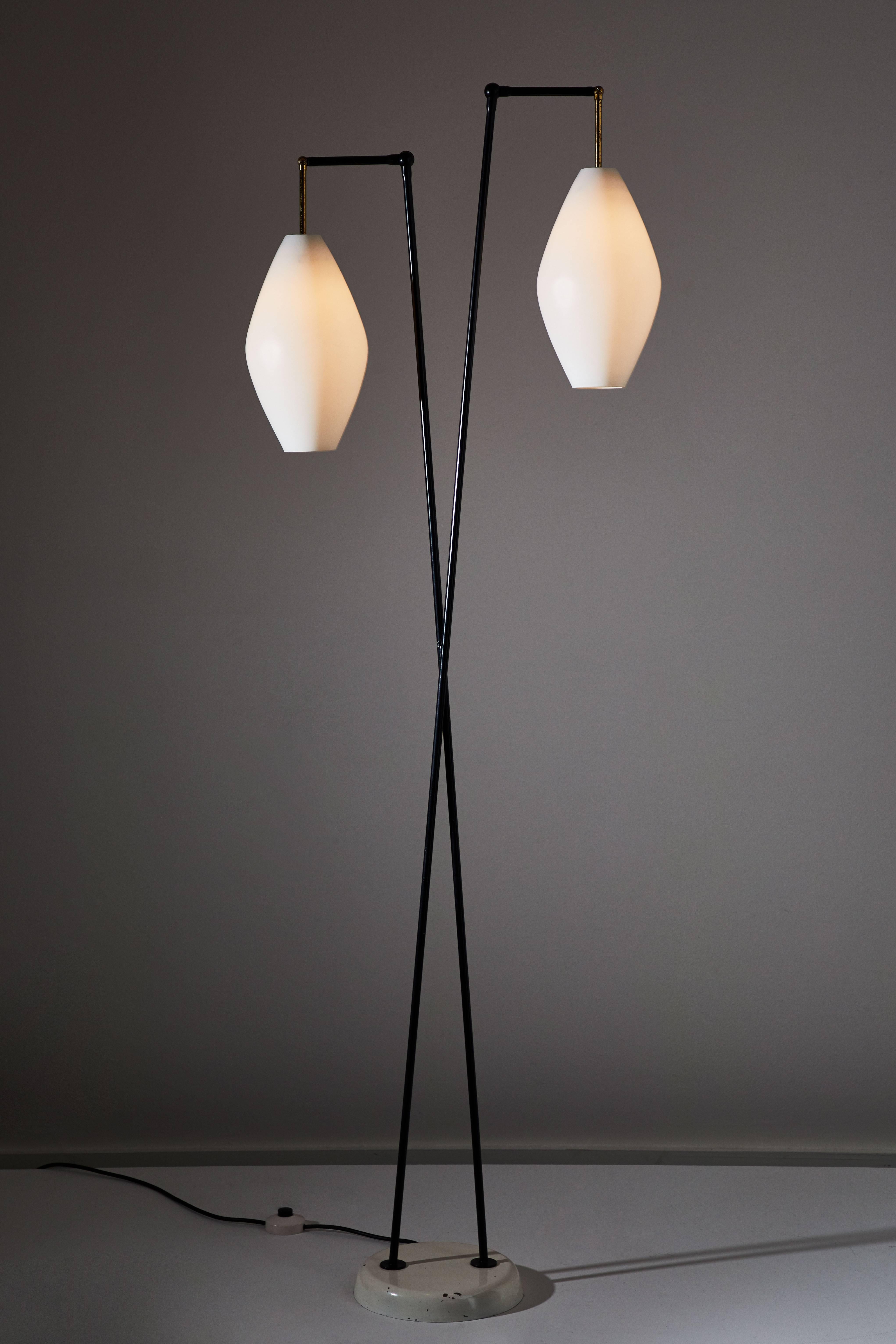 Floor lamp manufactured by Stilnovo in Italy, circa 1950s. Brushed satin glass shades, brass hardware, enameled metal stem and base. Original cord with step switch. Each shade takes one E27 75w maximum bulb.