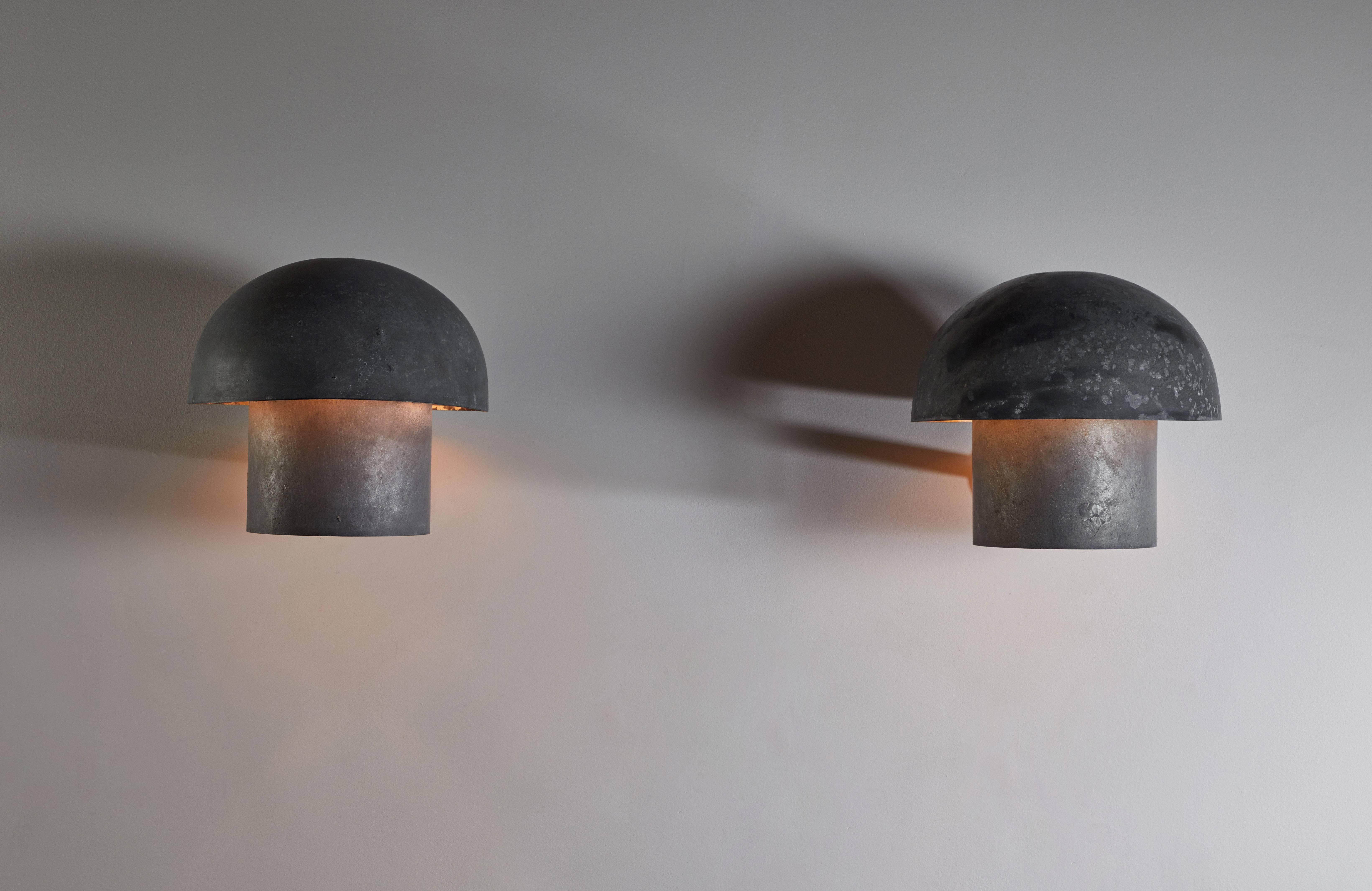 Pair of interior or exterior wall lights designed in Scandinavia, circa 1960s. Made of galvanized steel. Wired for US junction boxes. Each light takes one E27 100w maximum bulb.