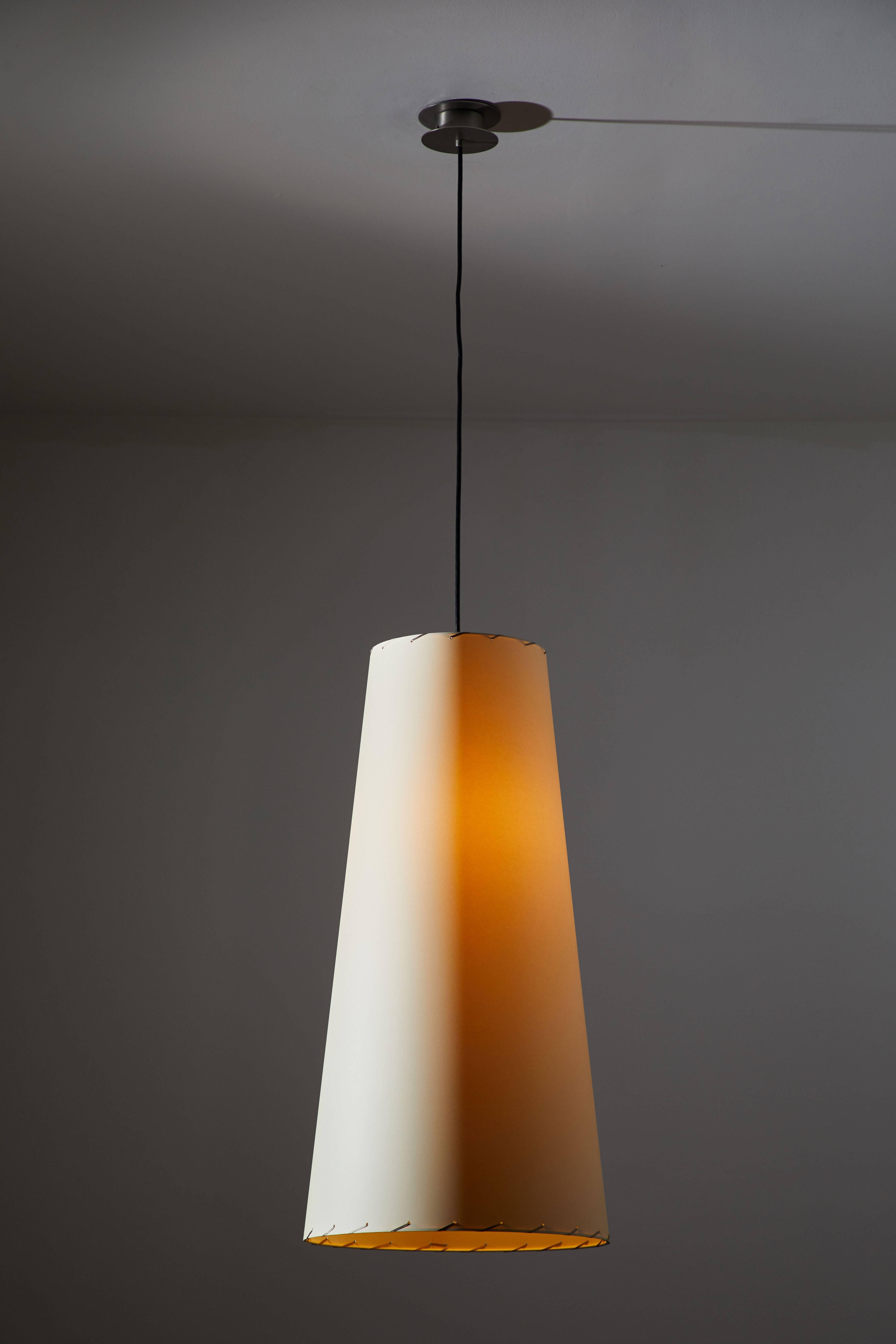GT4 pendant lamp by Gabriel Ordeig Cole for Santa & Cole. This re-edition is designed and manufactured in Barcelona, Spain. Originally designed for a famous Barcelona bar from the 1980s. Large cone-shaped, woven cardboard shade typically utilized in