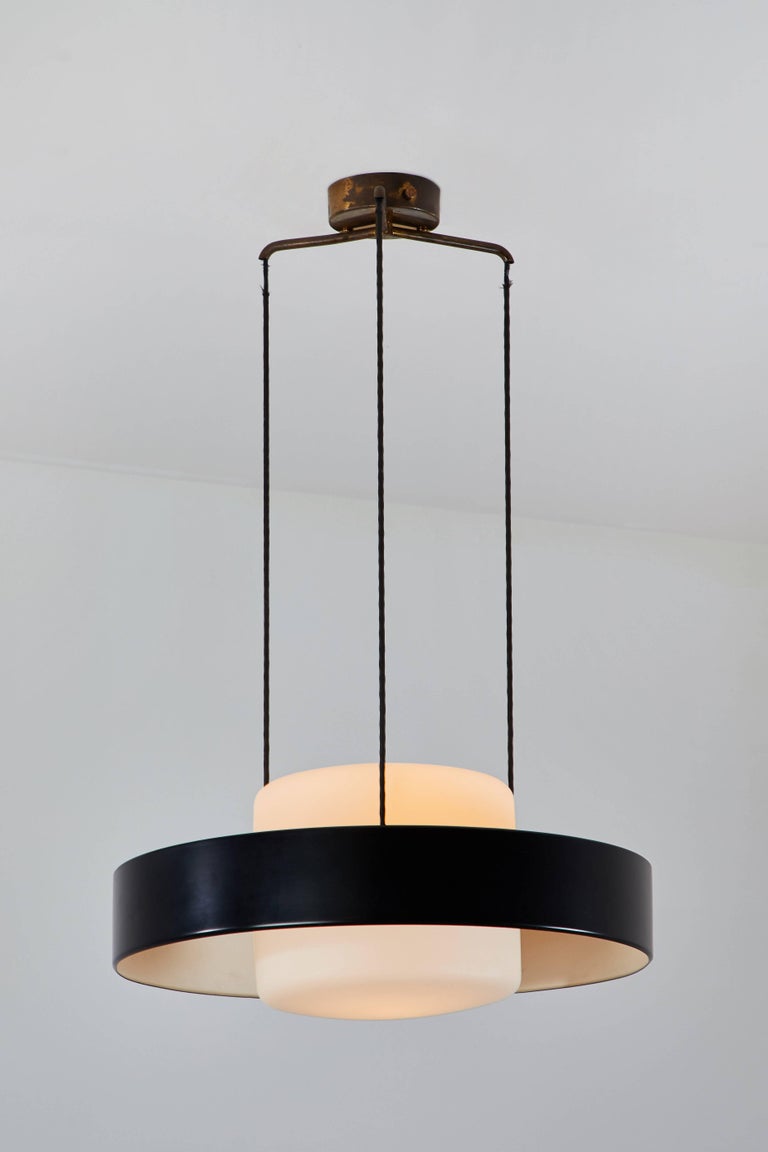 Rare Model 1158 chandelier with three prong suspension designed by Bruno Gatta. Manufactured by Stilnovo in Italy, circa 1960s. Wired for US junction boxes. Enameled metal with brushed satin glass diffuser. Original brass canopy and hardware. Takes