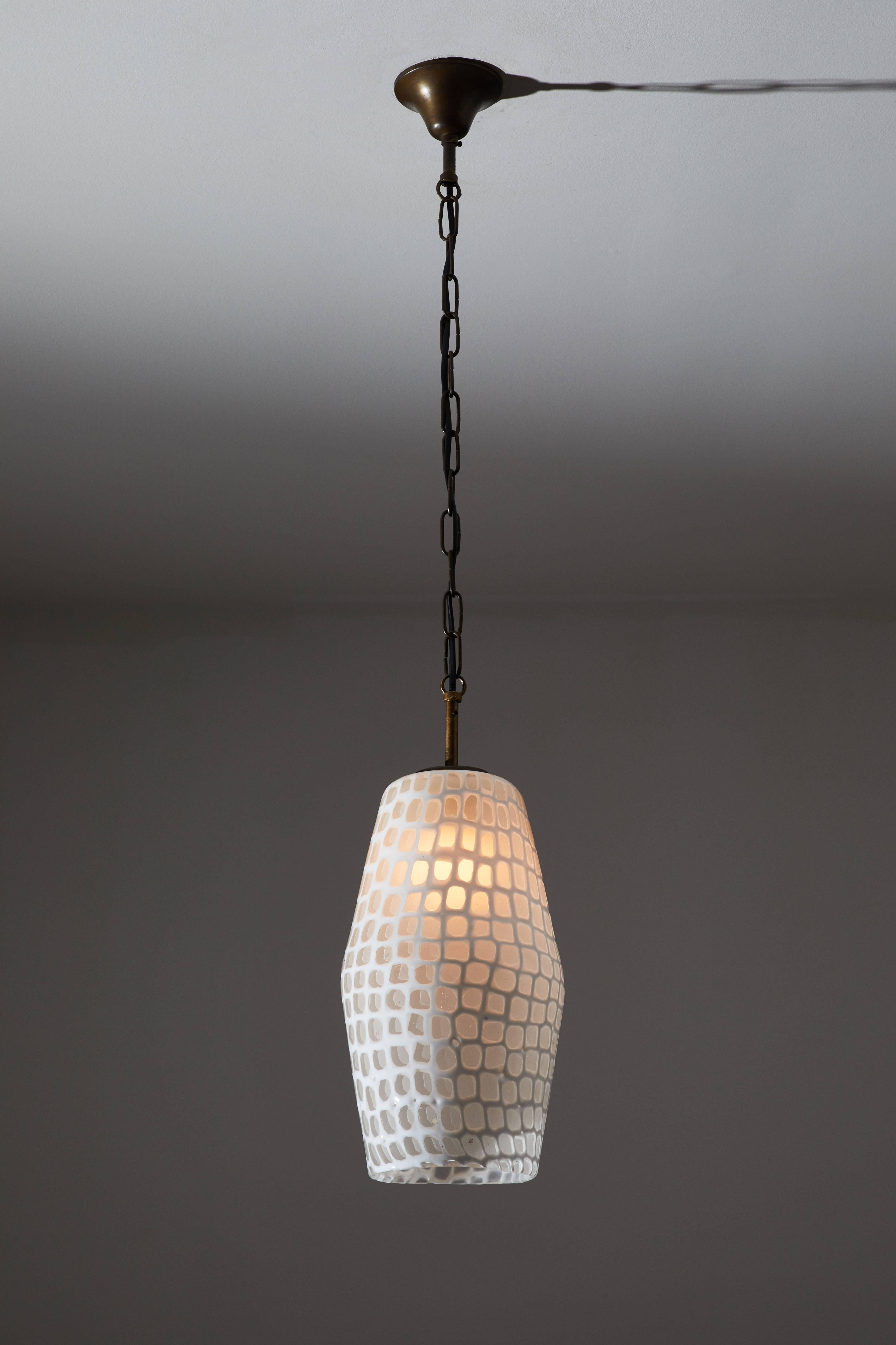 Suspension light designed by Tobia Scarpa in Italy, circa 1960s. Handblown and hand glazed Occhi glass diffuser. Wired for US junction boxes. Original brass chain and canopy. Takes one E27 100w maximum bulb. Height displayed is for fixture only.