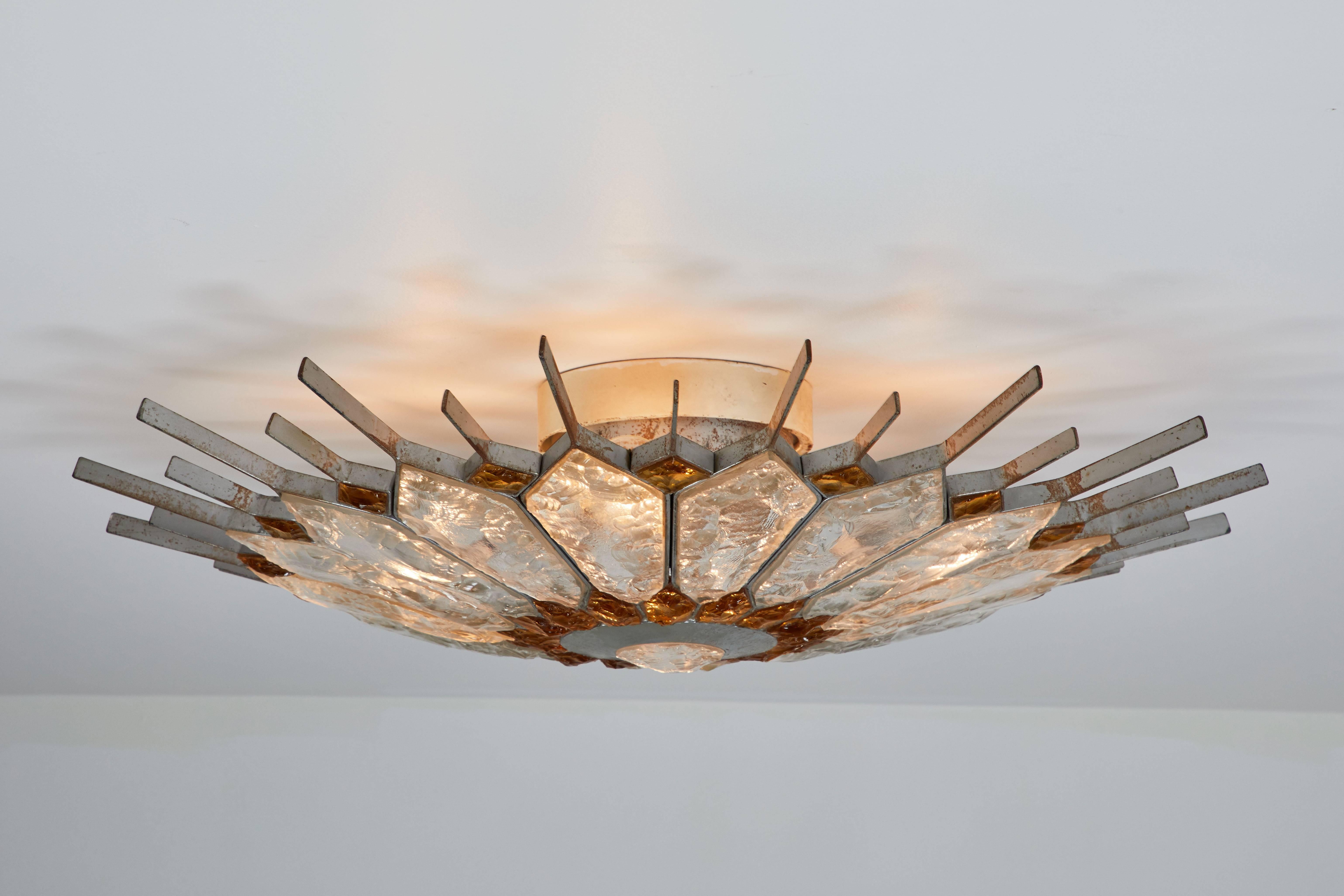 Flush mount ceiling light designed in the 1970s in Verona Italy by Longobard. Mosaic cut-glass with a chiseled surface and welded steel. Wired for US junction boxes. Takes four E27 60w maximum bulbs
