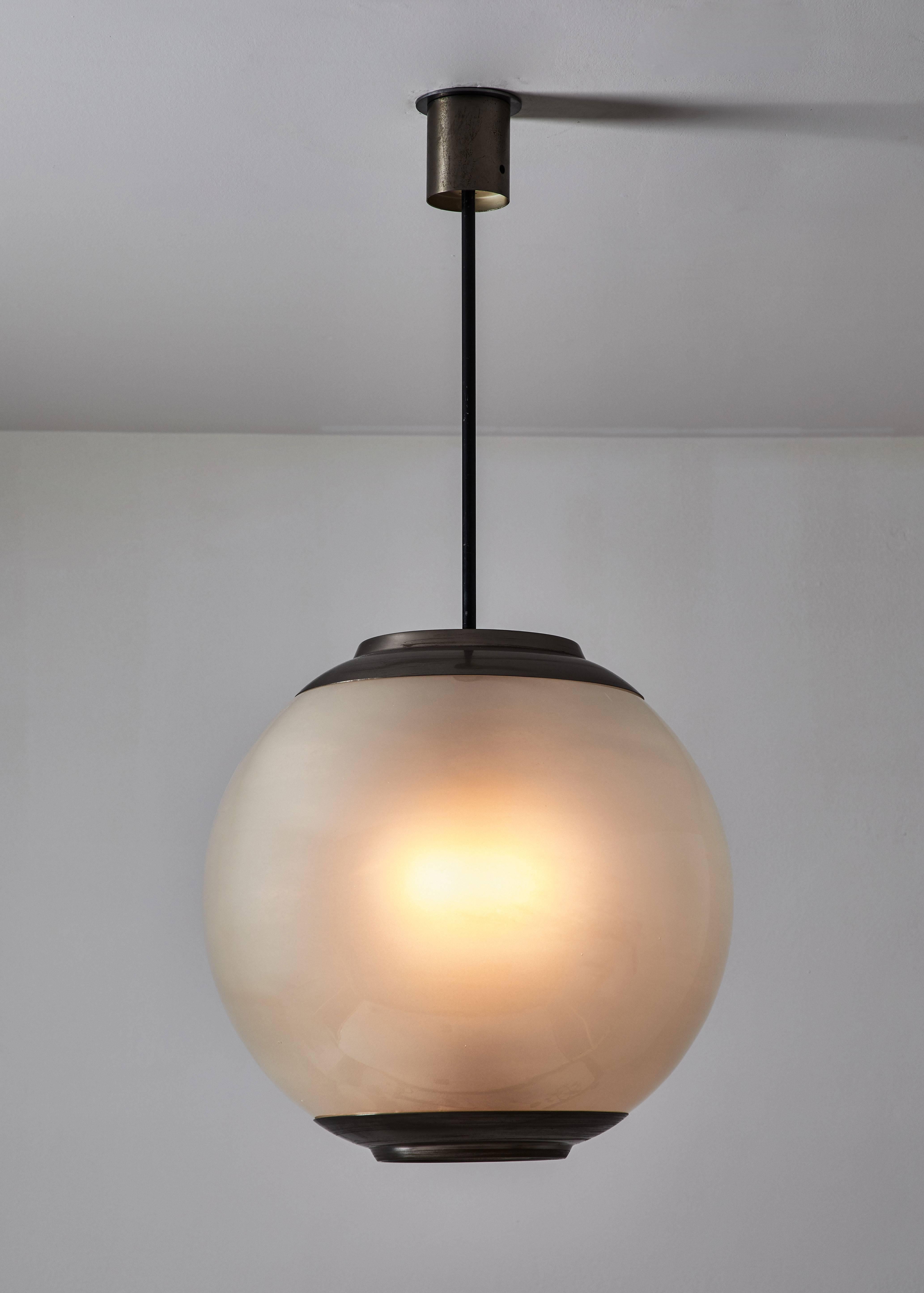 Large Model LS2 Pendant by Luigi Caccia Dominioni for Azucena. Designed and manufactured in Italy circa 1950's. This model is no longer being reproduced. Nickel-plated brass, polished glass diffuser that has been sanded on the inside. Wired for US