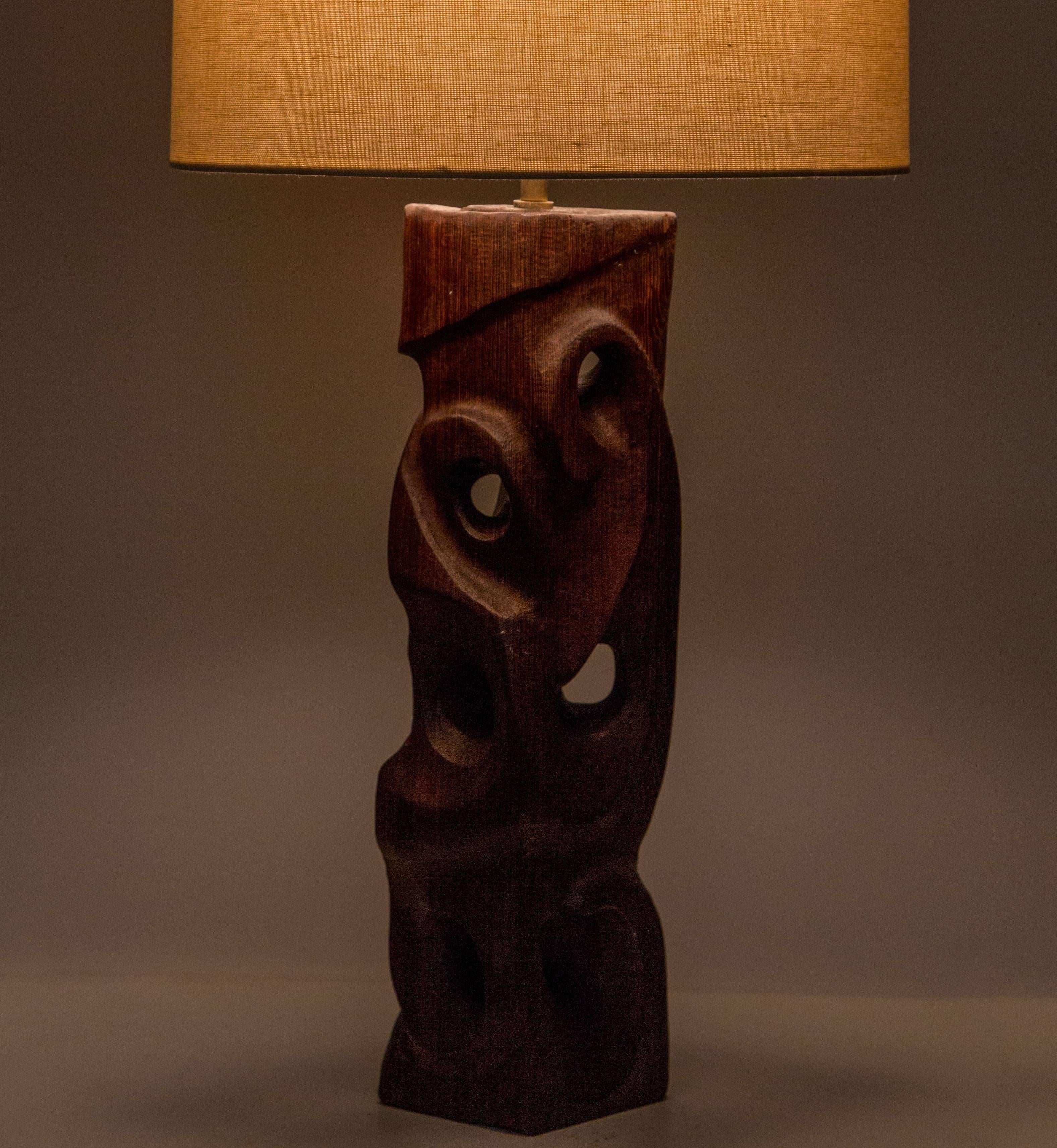 Studio hand-carved table lamp.