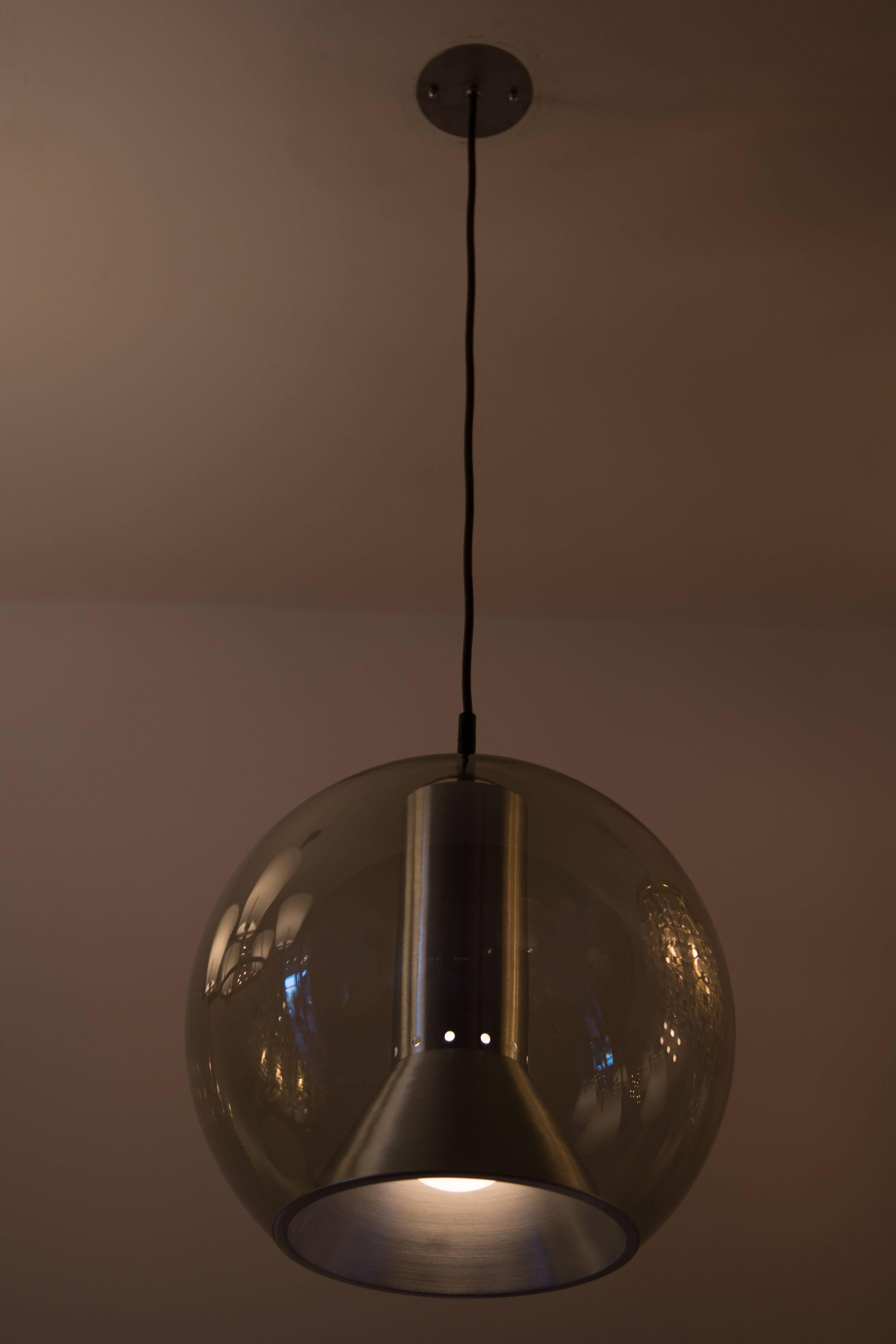 Large RAAK pendant. Smoked glass globe with aluminum shade.