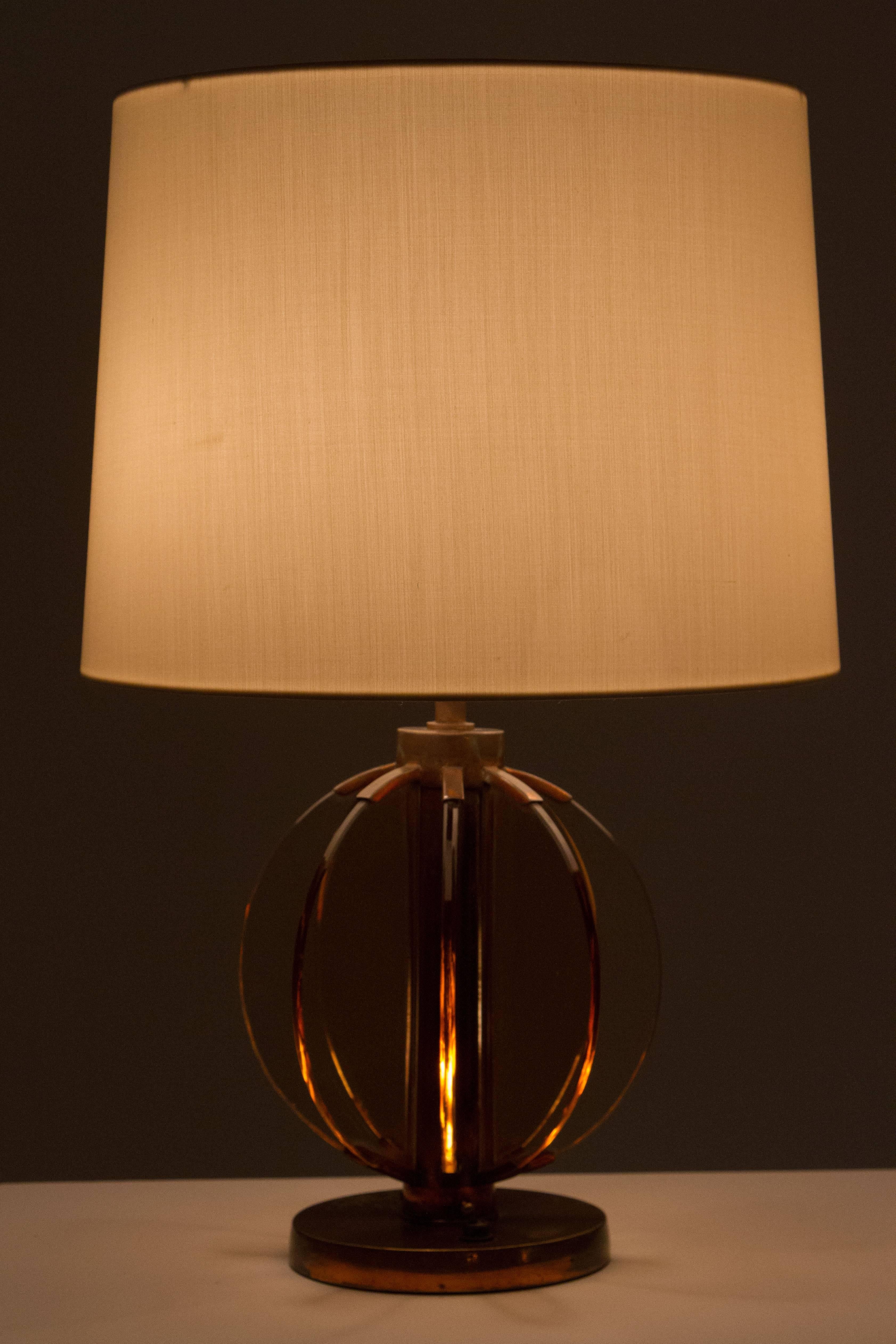 Copper and amber glass table lamp attributed to Fontana Arte. Base illuminates and has separate switch.
Shade not included. 