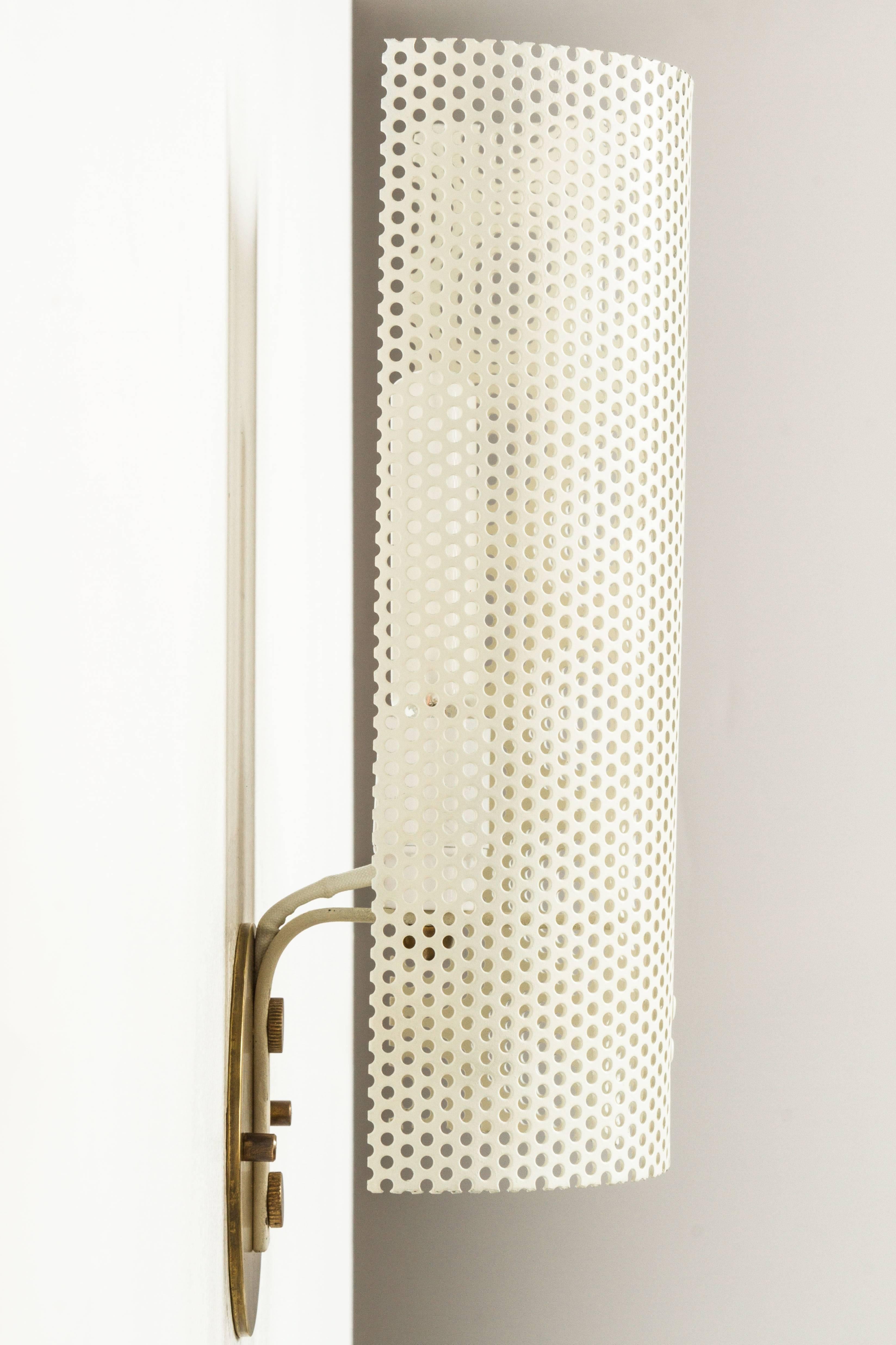 Pair of French Perforated Sconces In Excellent Condition In Los Angeles, CA