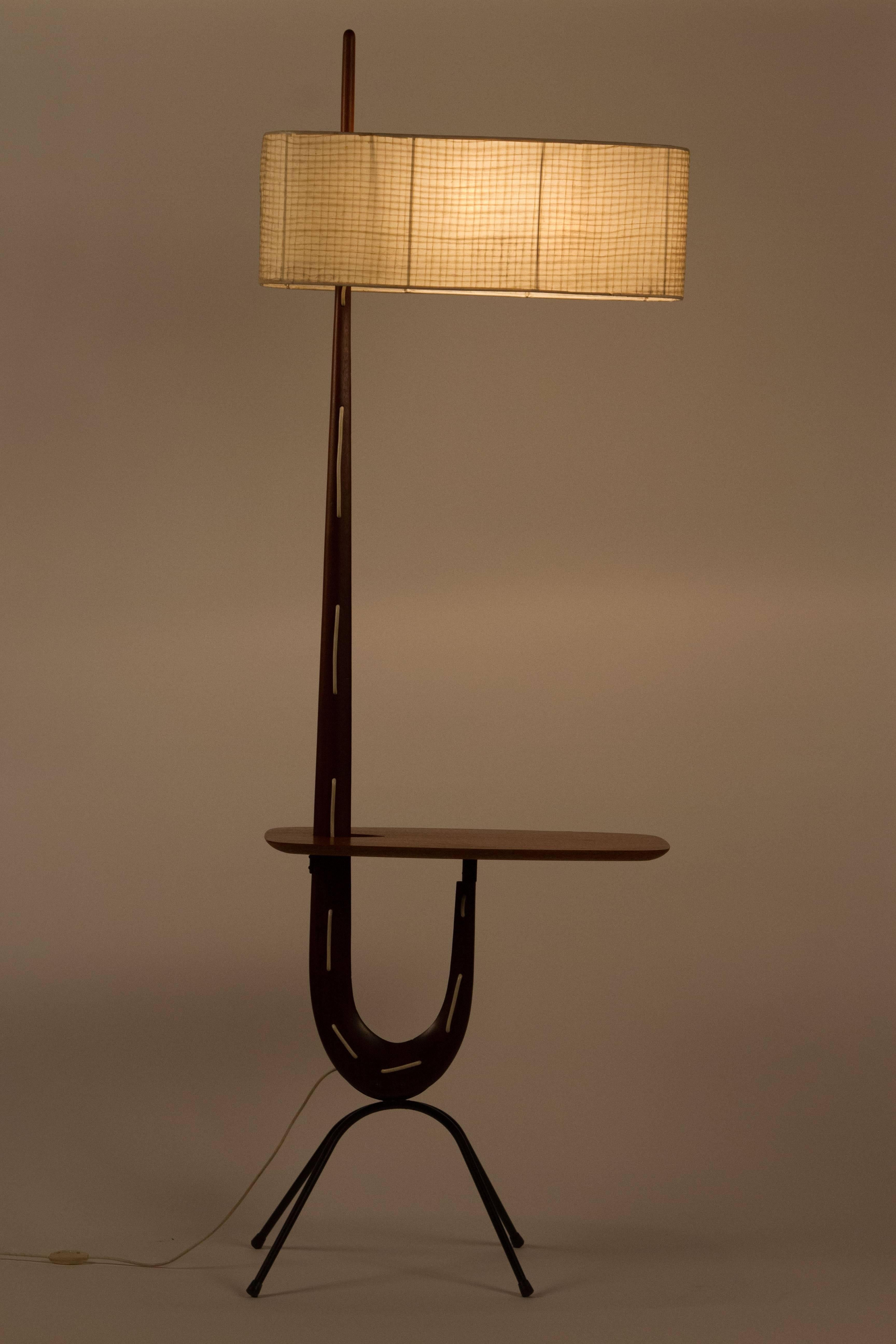 Rare walnut floor lamp with table and original shade.