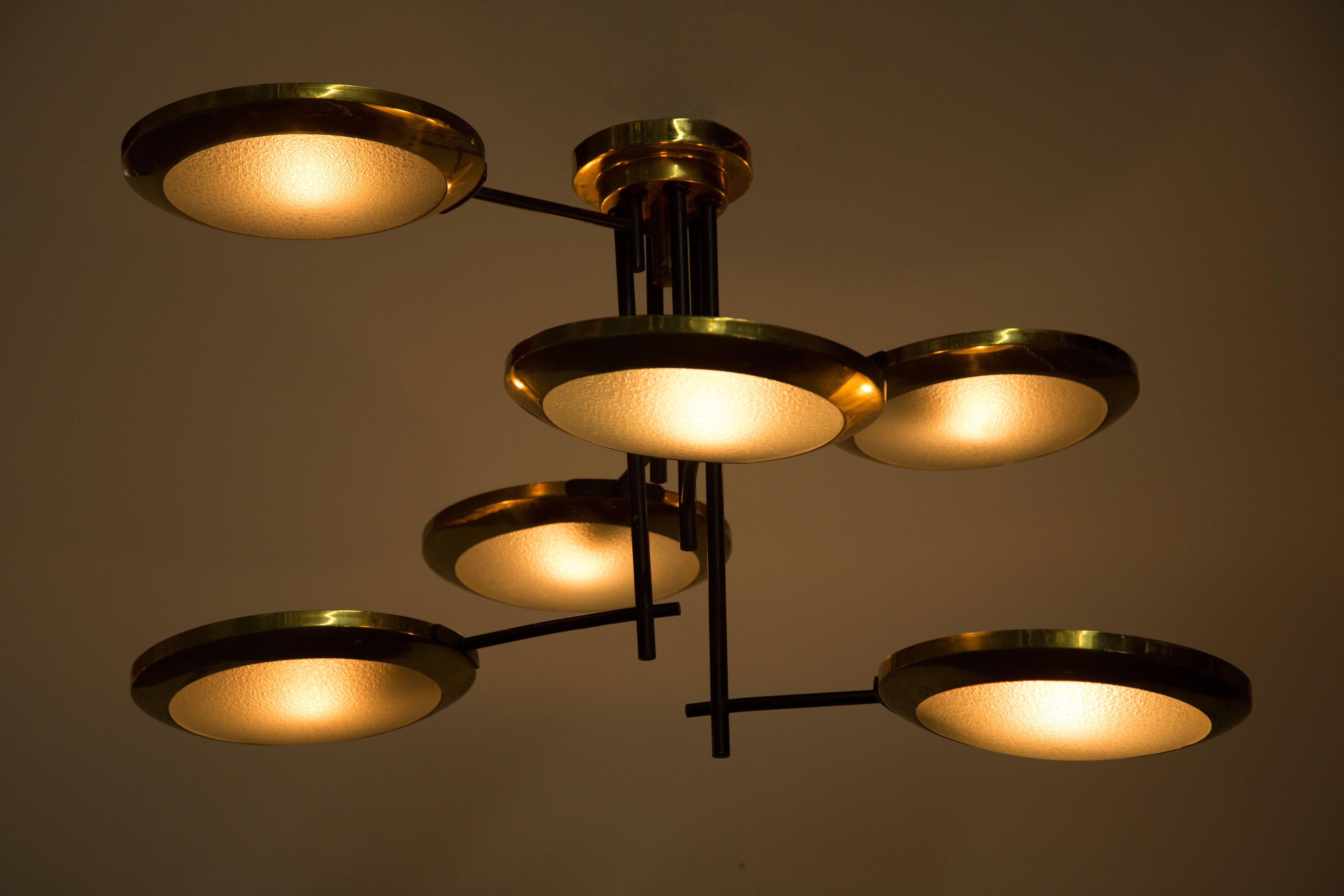 Six Arm Chandelier manufactured by Stilnovo in Italy circa 1950's.  Brass, metal and textured glass. Rewired for US junction boxes. Takes 6 E14 European 25w maximum bulbs. 