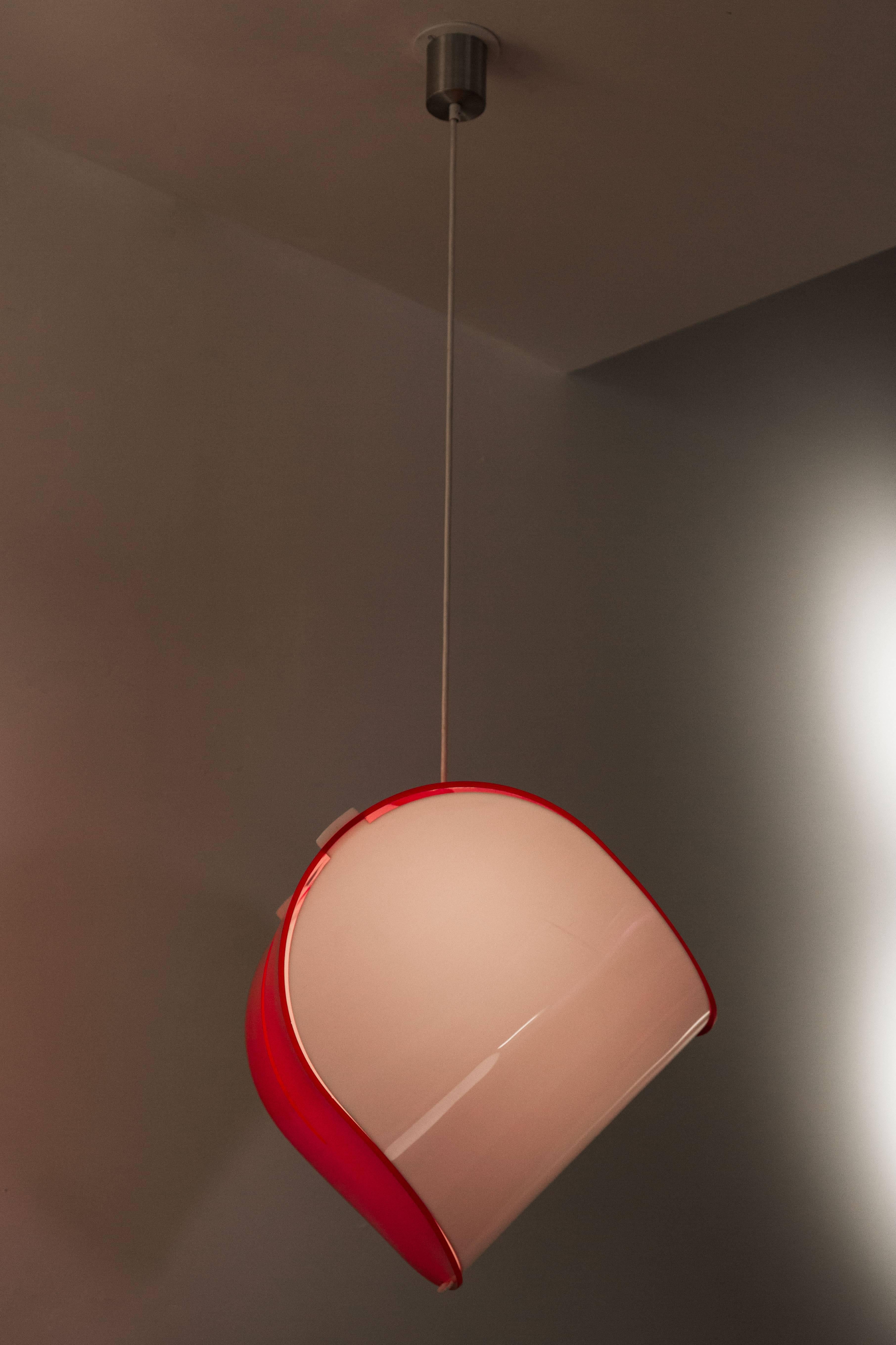Red and white acrylic suspension lamp by Gerd Lange for Kartell, Milan. E27 75w maximum bulb. Overall drop can be adjusted. Original socket with new wire.
