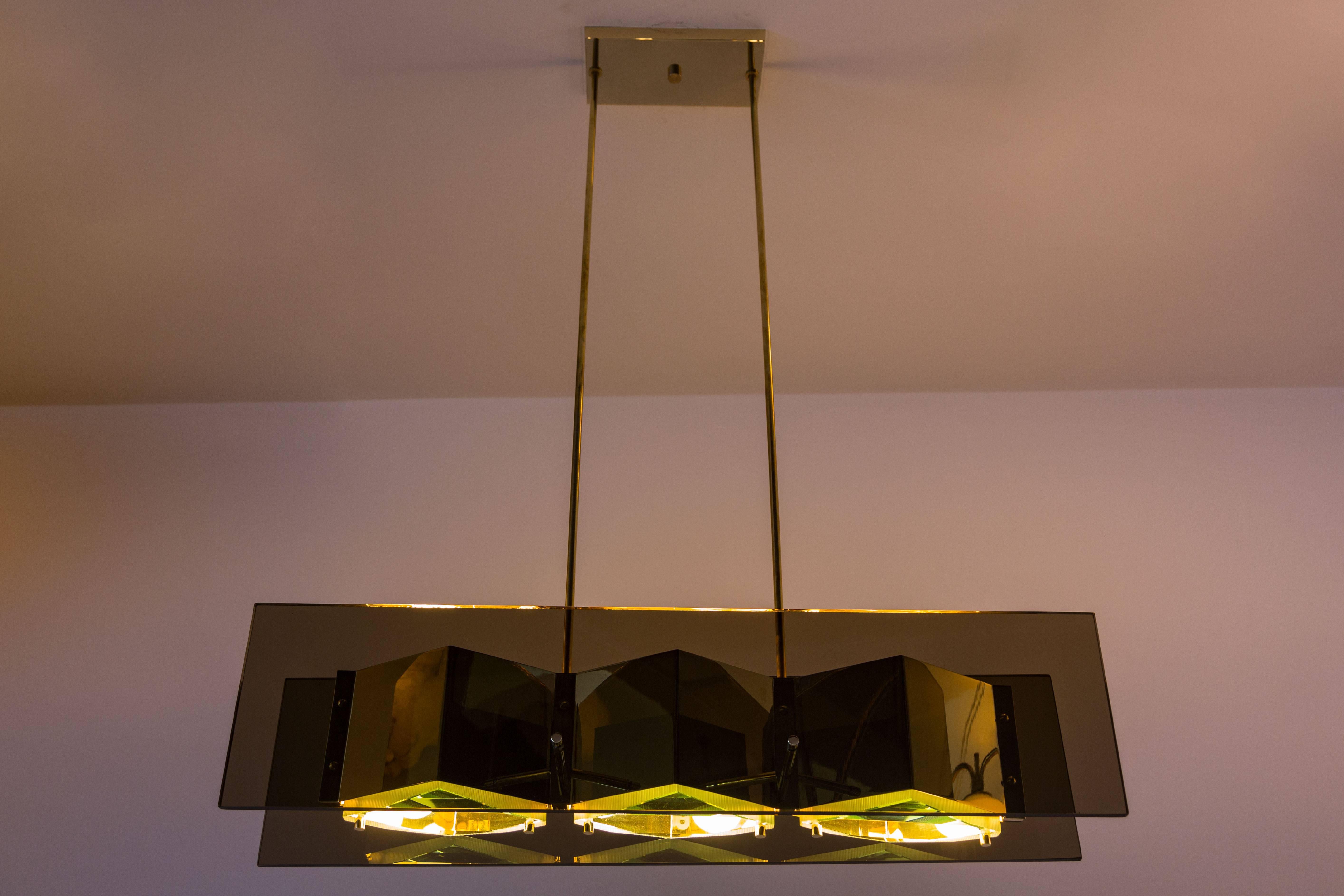 Italian Stilnovo Chandelier with Brass Shades and Green Glass Diffusers