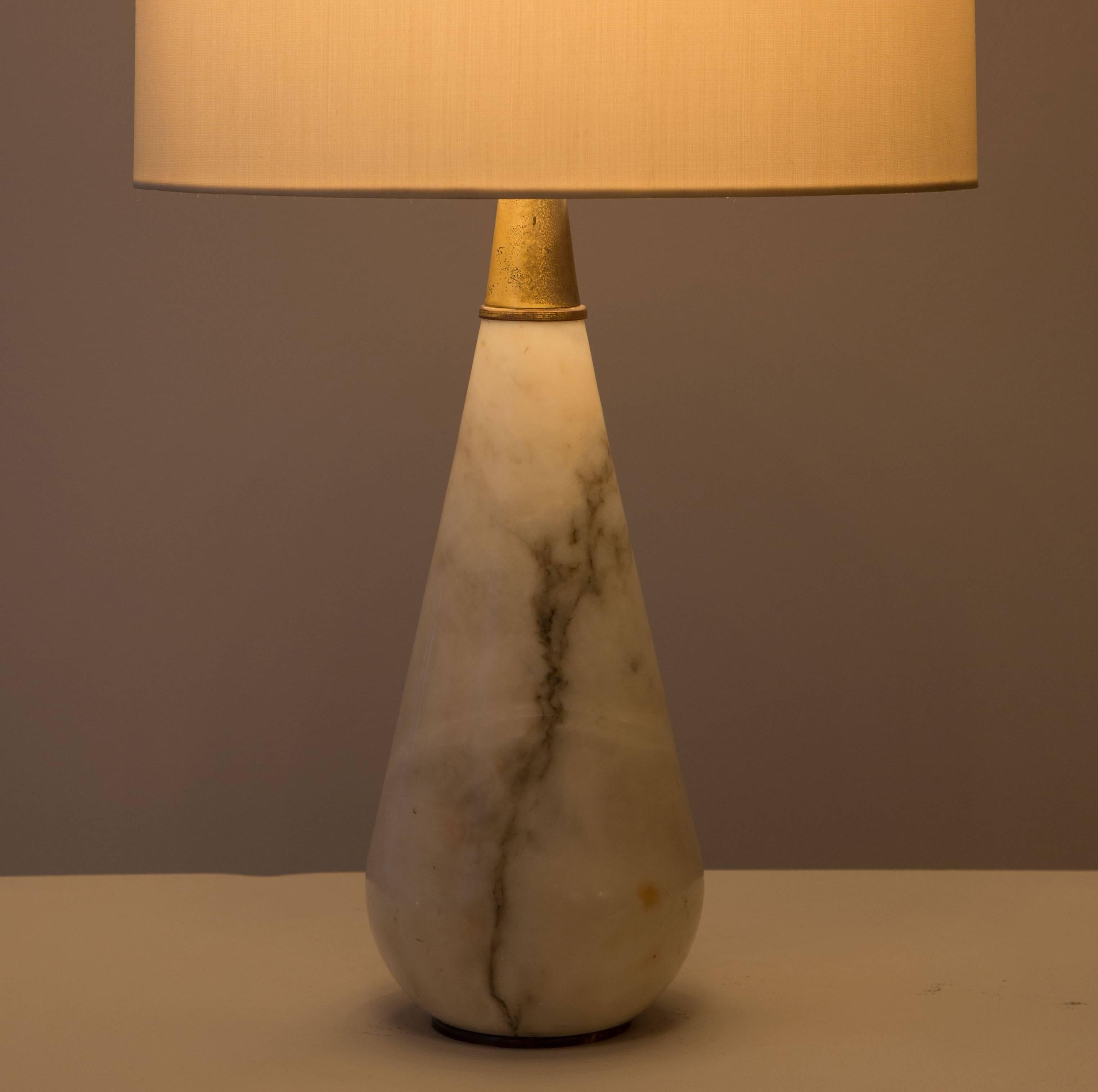 Pair of Italian Carrara marble table lamps made in Italy in the 1950s. Brass hardware. Original cords. Shades not included. Each light takes an E27 75W maximum bulb.