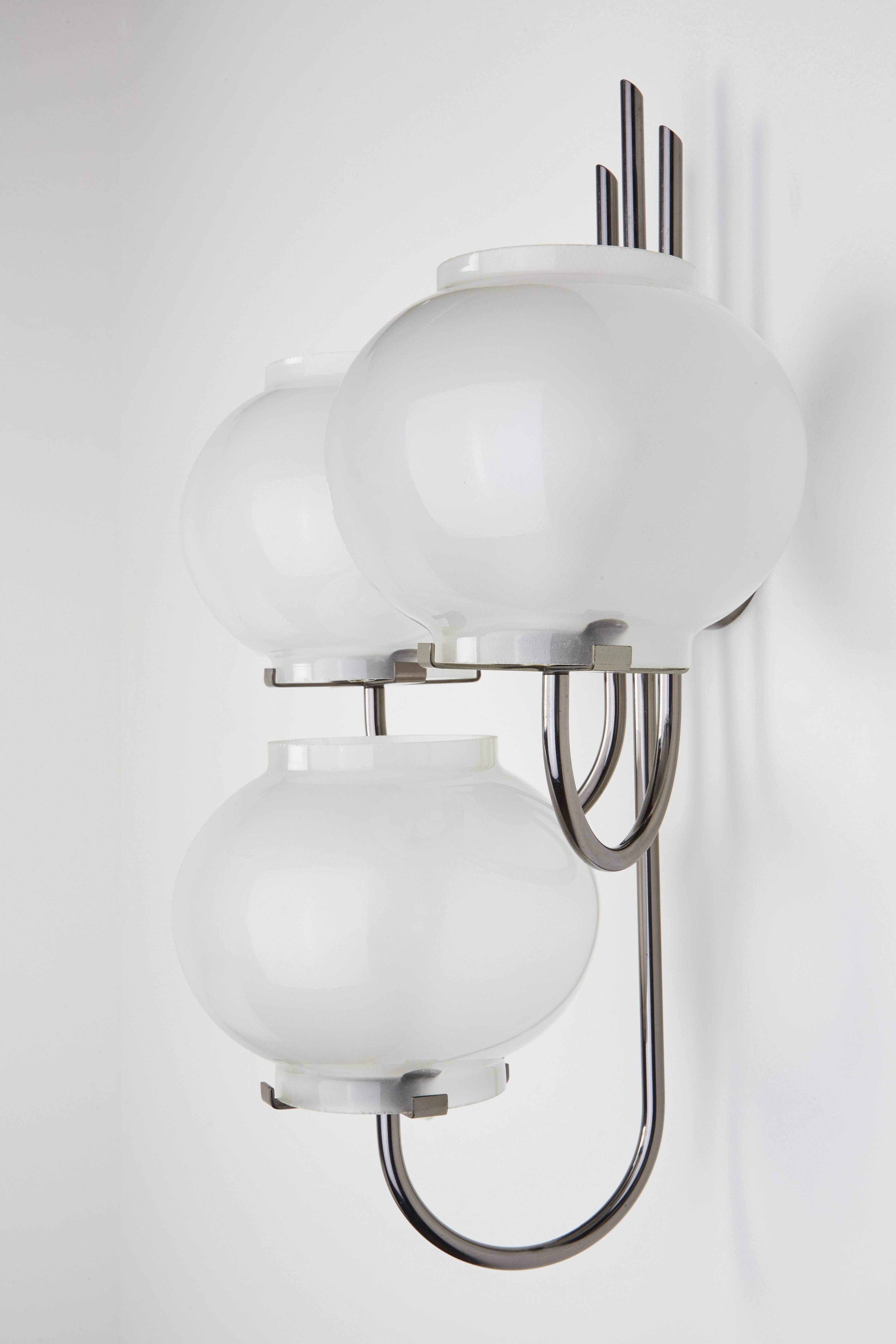 Nickel Pair of Sconces by Tito Agnoli for Oluce