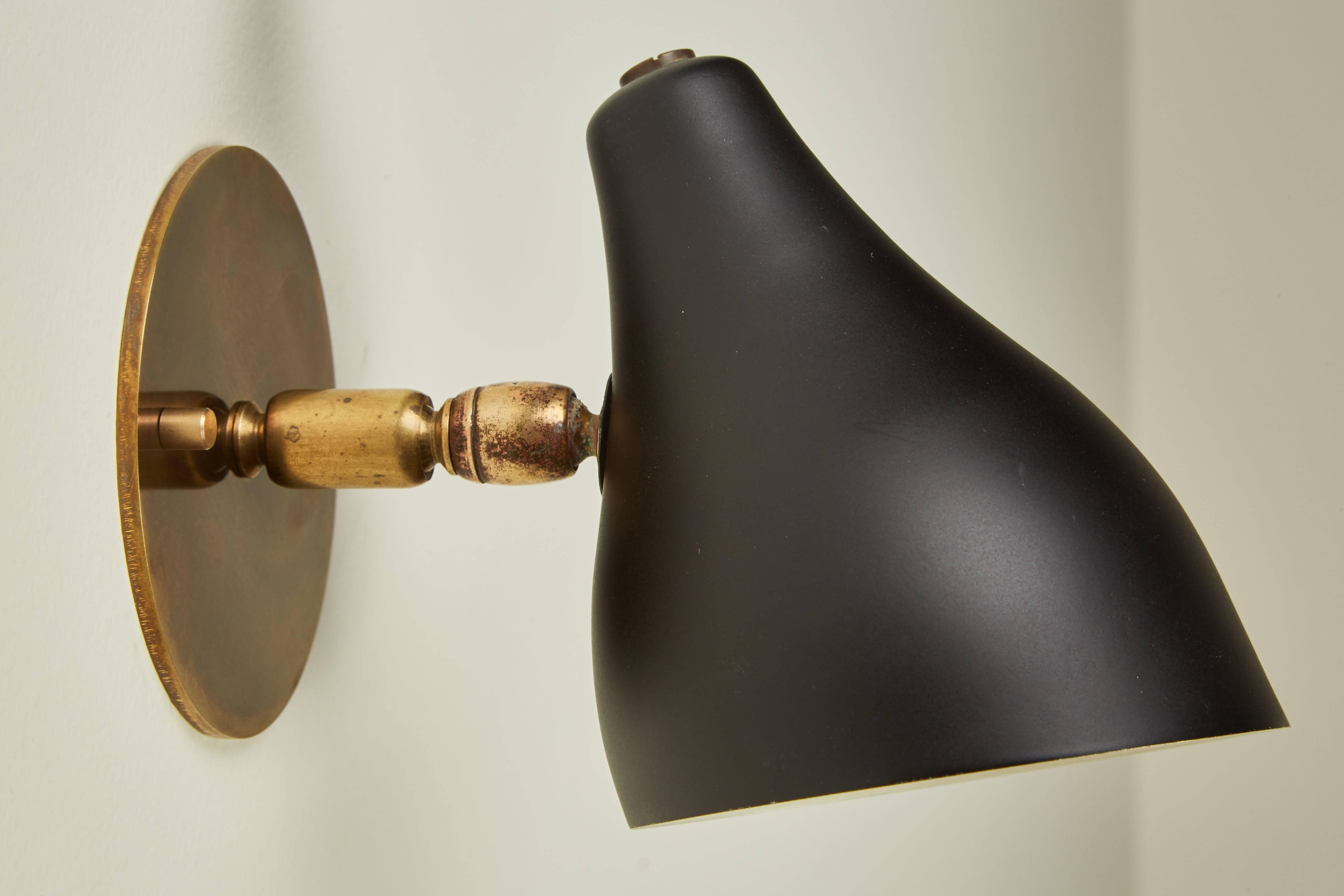 Mid-Century Modern Seven Articulating Brass and Metal Sconces by Stilux