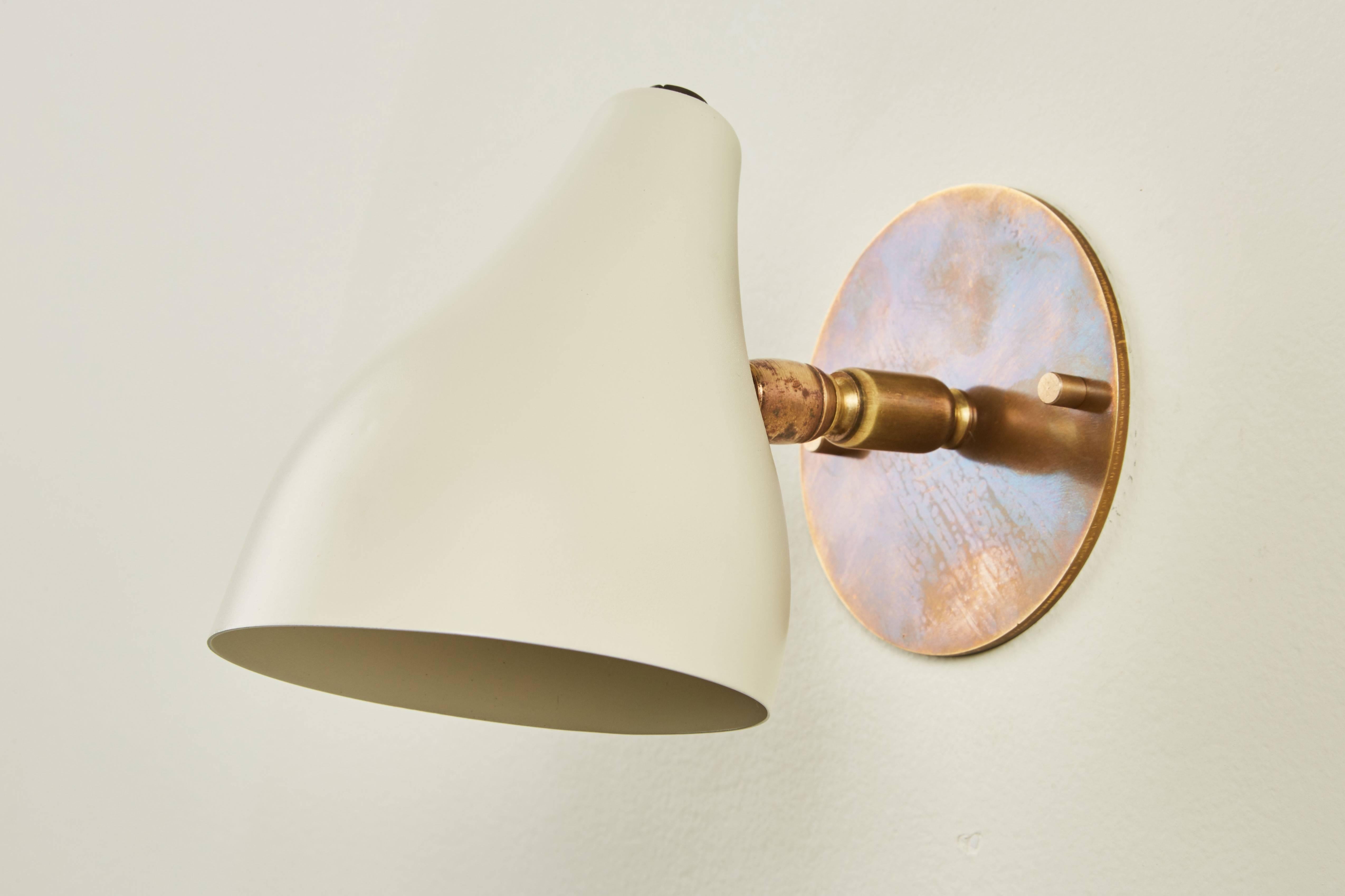 Painted Seven Articulating Brass and Metal Sconces by Stilux