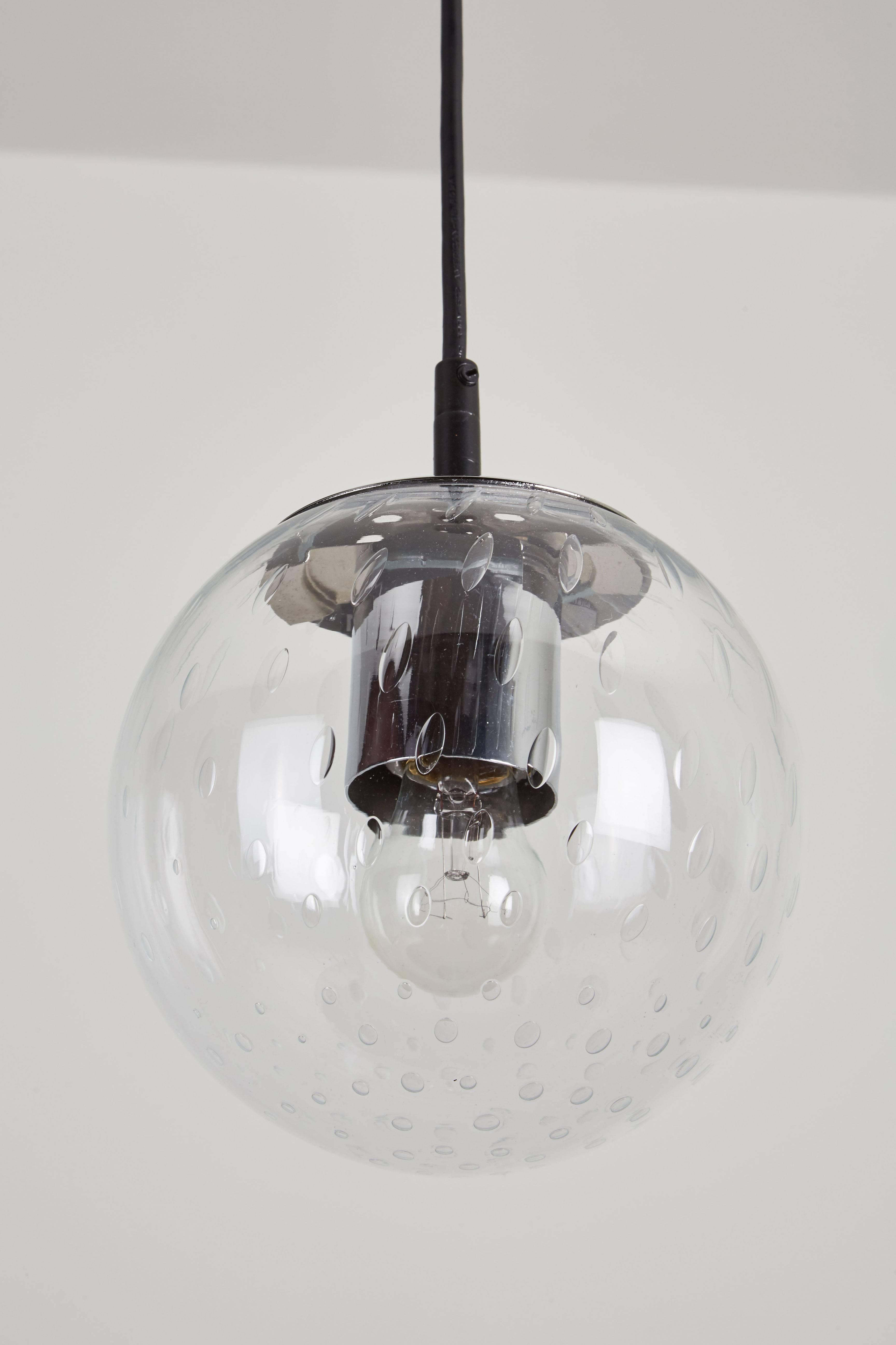 Mid-Century Modern Set of 15 Small Glass Globe Pendants by RAAK