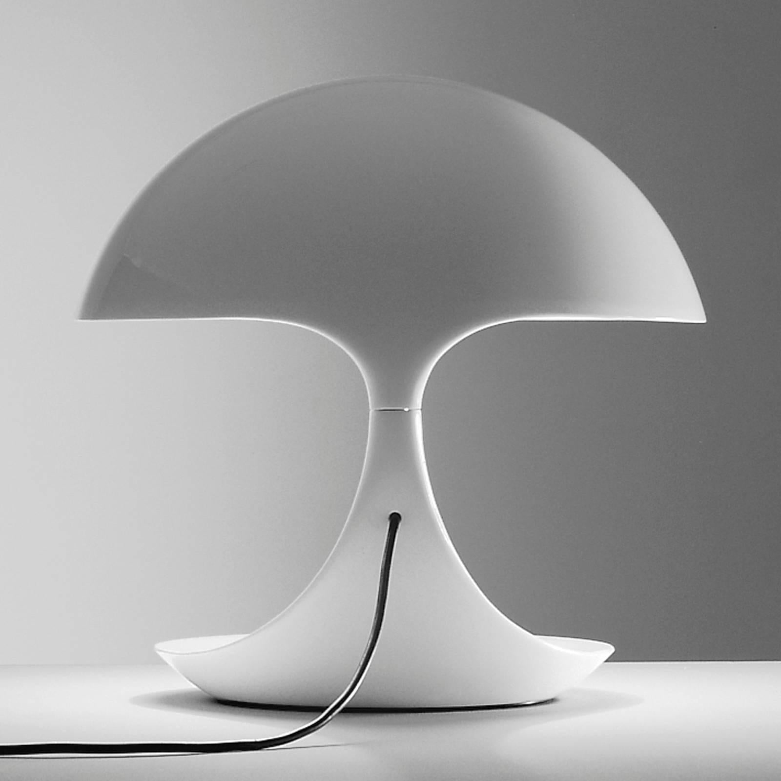 Current production cobra table lamp originally designed by Elio Martinelli in 1968 for Martinelli Luce. Swivel table lamp that provides direct light. Made of Resin. Comes in white or black. The lower body rotates on the steel base and is connected