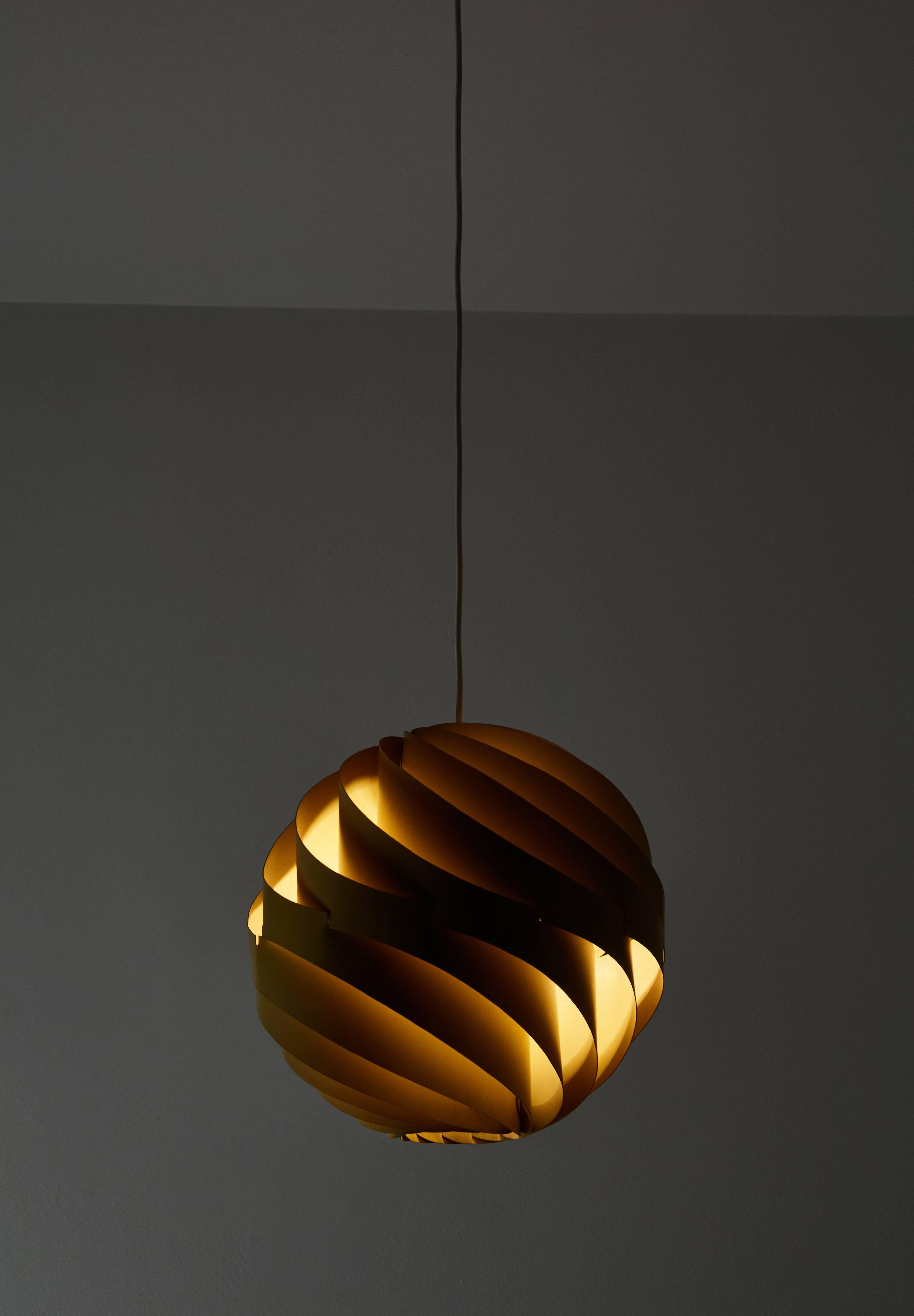 Unique pair of Turbo Pendants by Louis Weisdorf for Lyfa enameled aluminium . Designed in Denmark circa 1960s. Twelve Aluminum slats, spirally twisted and mounted together, to give the spherical shape of a round ball. Priced and sold individually.