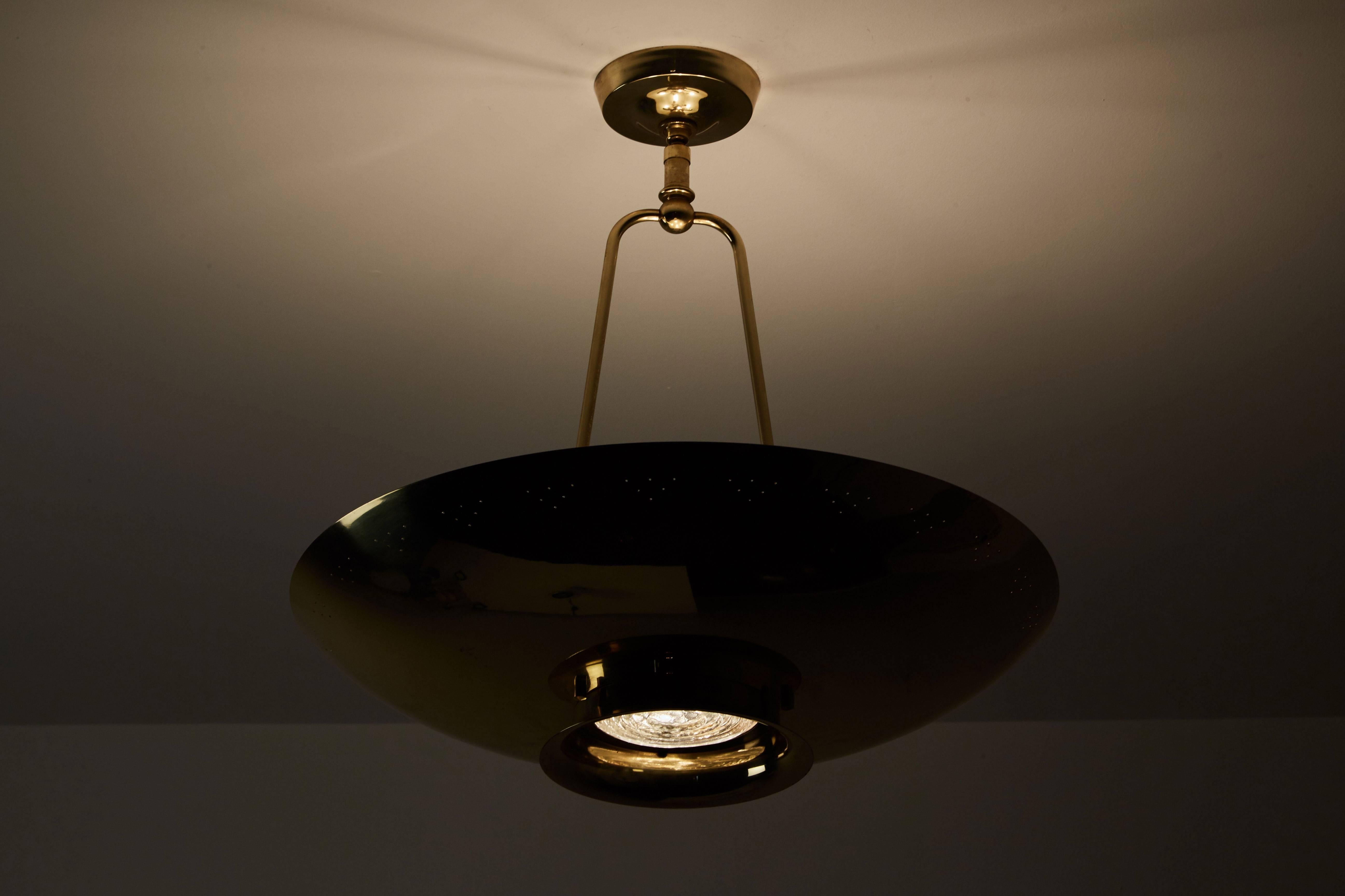 Perforated brass ceiling light by Stiffel. Designed in the United States, circa 1950s. Holophane glass diffuser provides downlight. Retains original manufacturers label. Takes five E26 25w maximum bulbs.