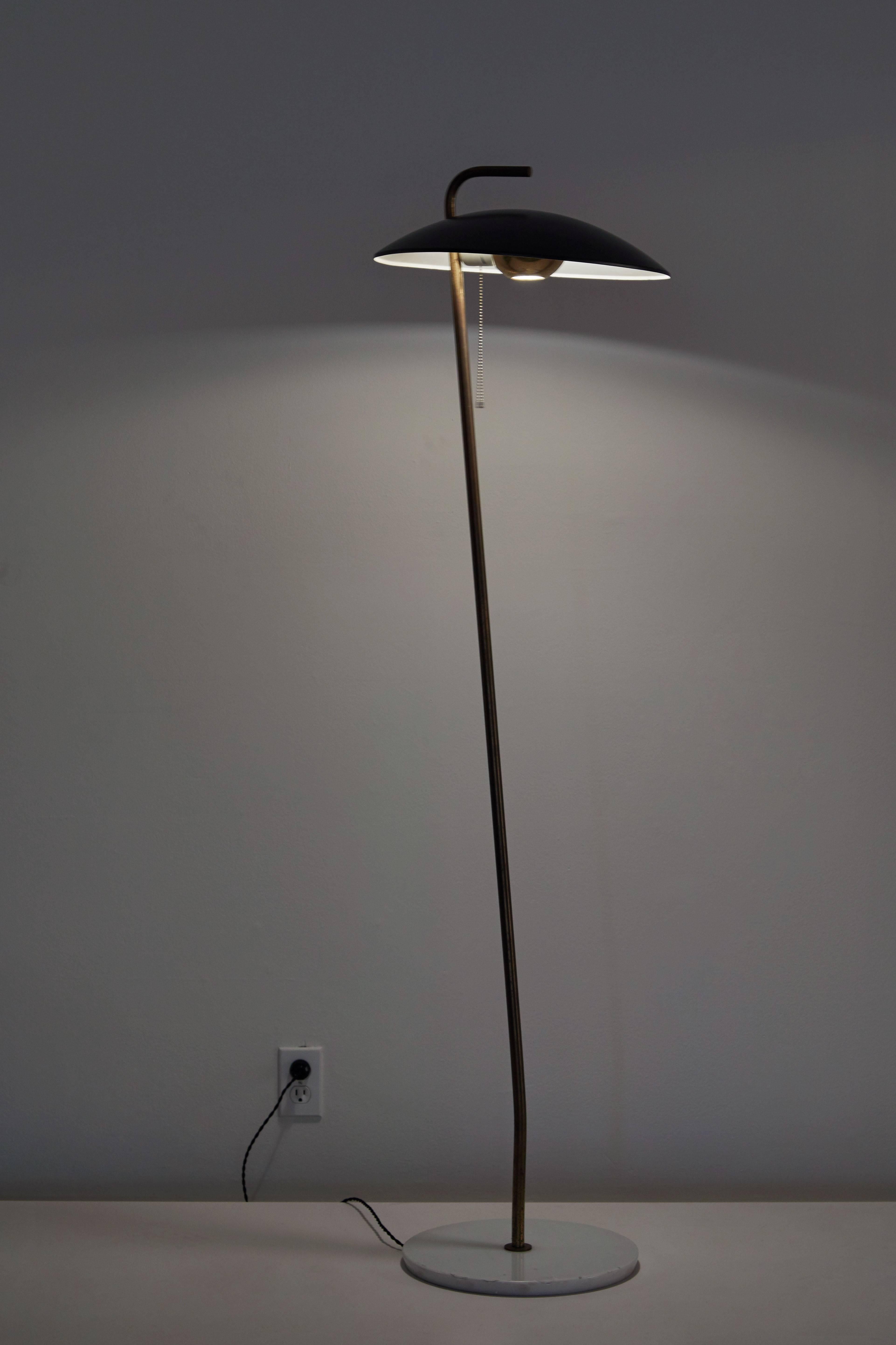 Rare floor lamp by Stilnovo designed in Italy, circa 1950s. Metal shade and brass stem with marble base. Takes one E27 100w maximum bulb. Rewired with French twist silk cord.