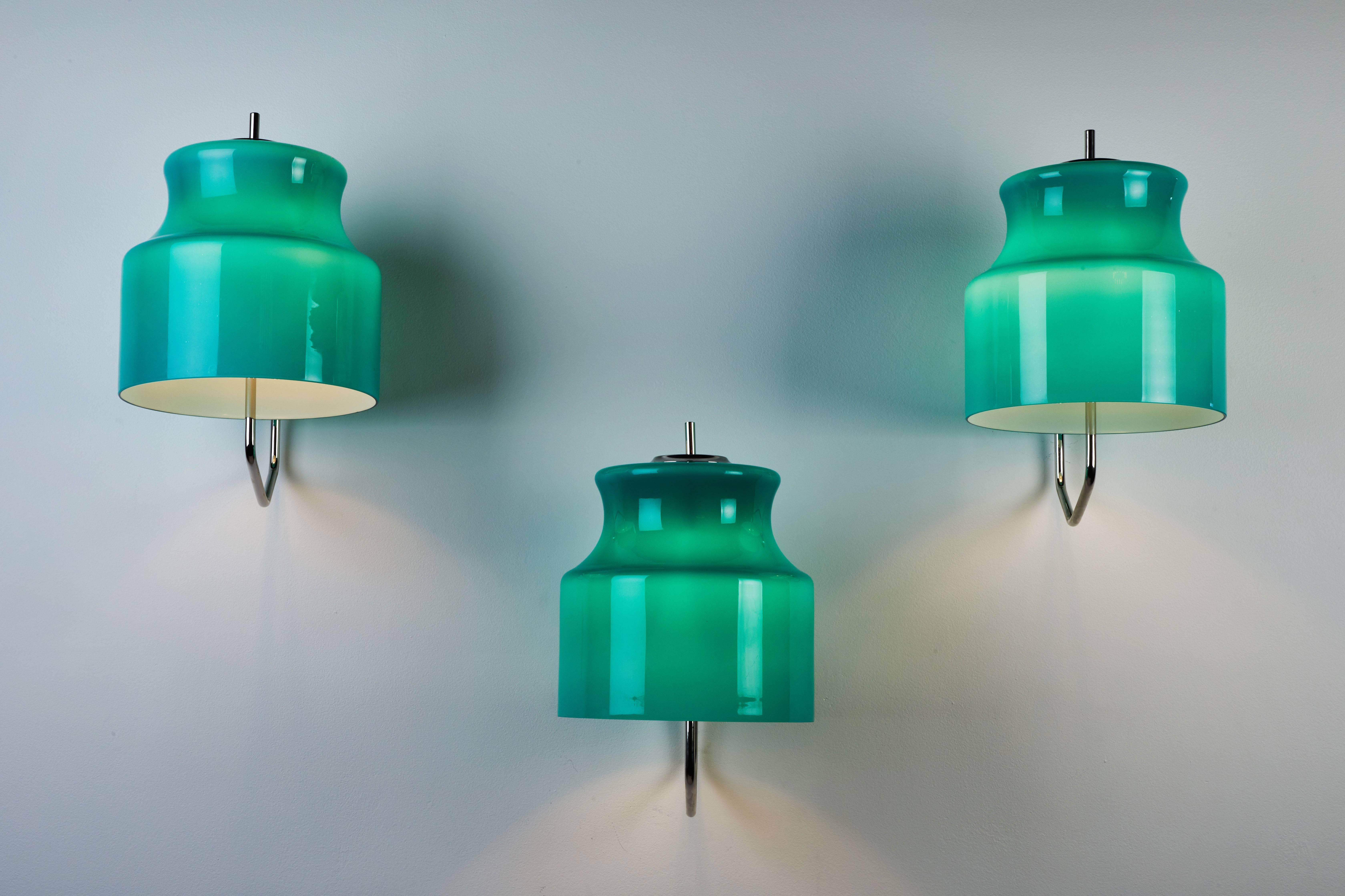 Three original blown glass sconces by Venini designed in Italy, circa 1960s. Re-plated to original nickel-plated brass finish. Custom nickel-plated brass backplates. Wired for US junction boxes. Sold and priced individually. Each light takes one E26