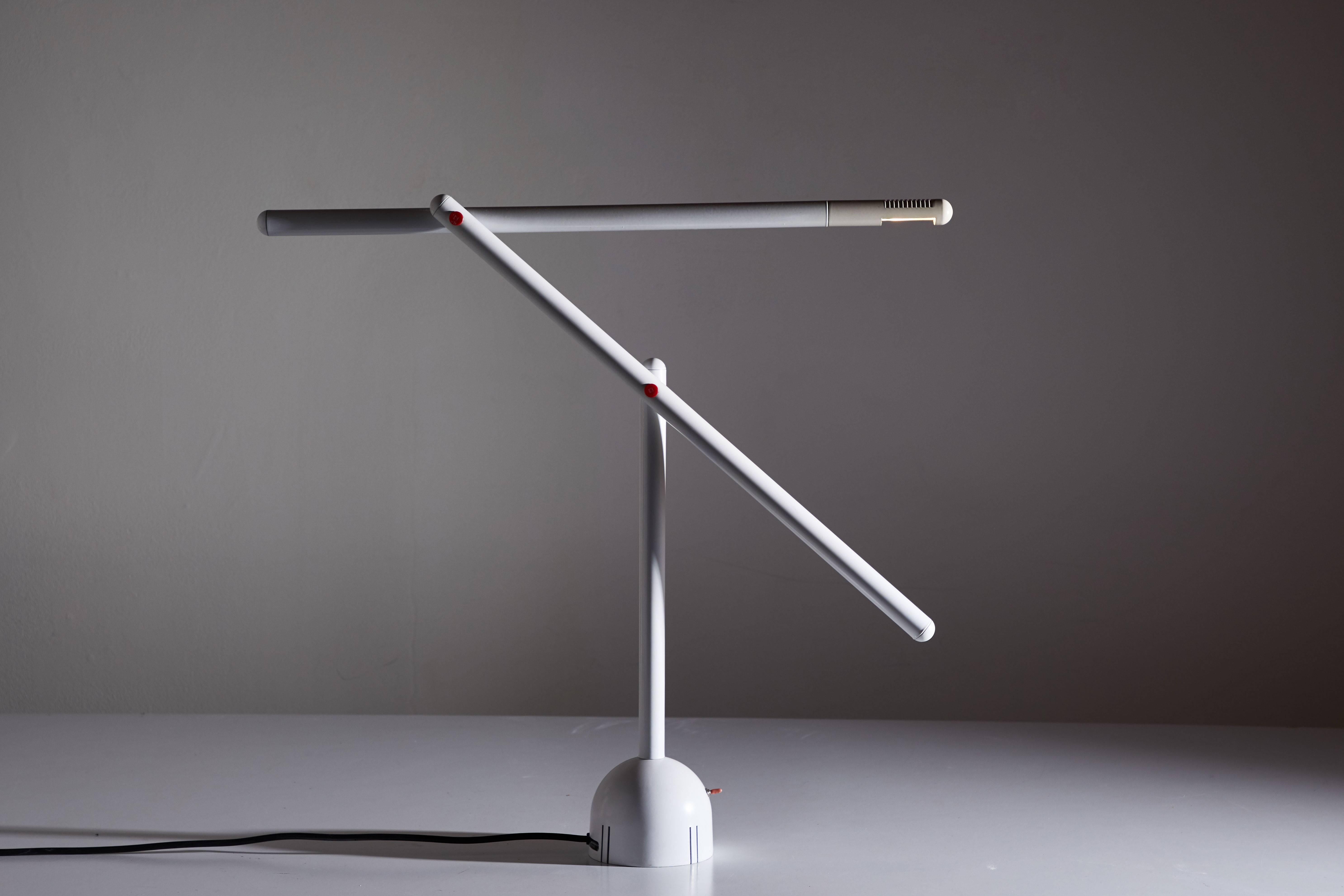 Articulated Mira table lamp by Mario Arnaboldi designed in Italy, circa 1980s. Enameled metal and aluminum construction with pivoting head. Original cord. Takes one G9 halogen bulb. Original finish. Original manufacturers label. Dimensions are