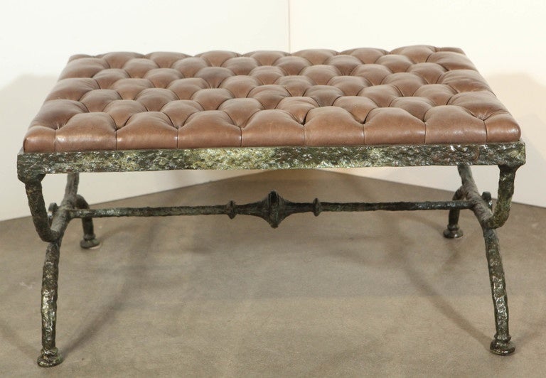 pair of tufted bronze benches