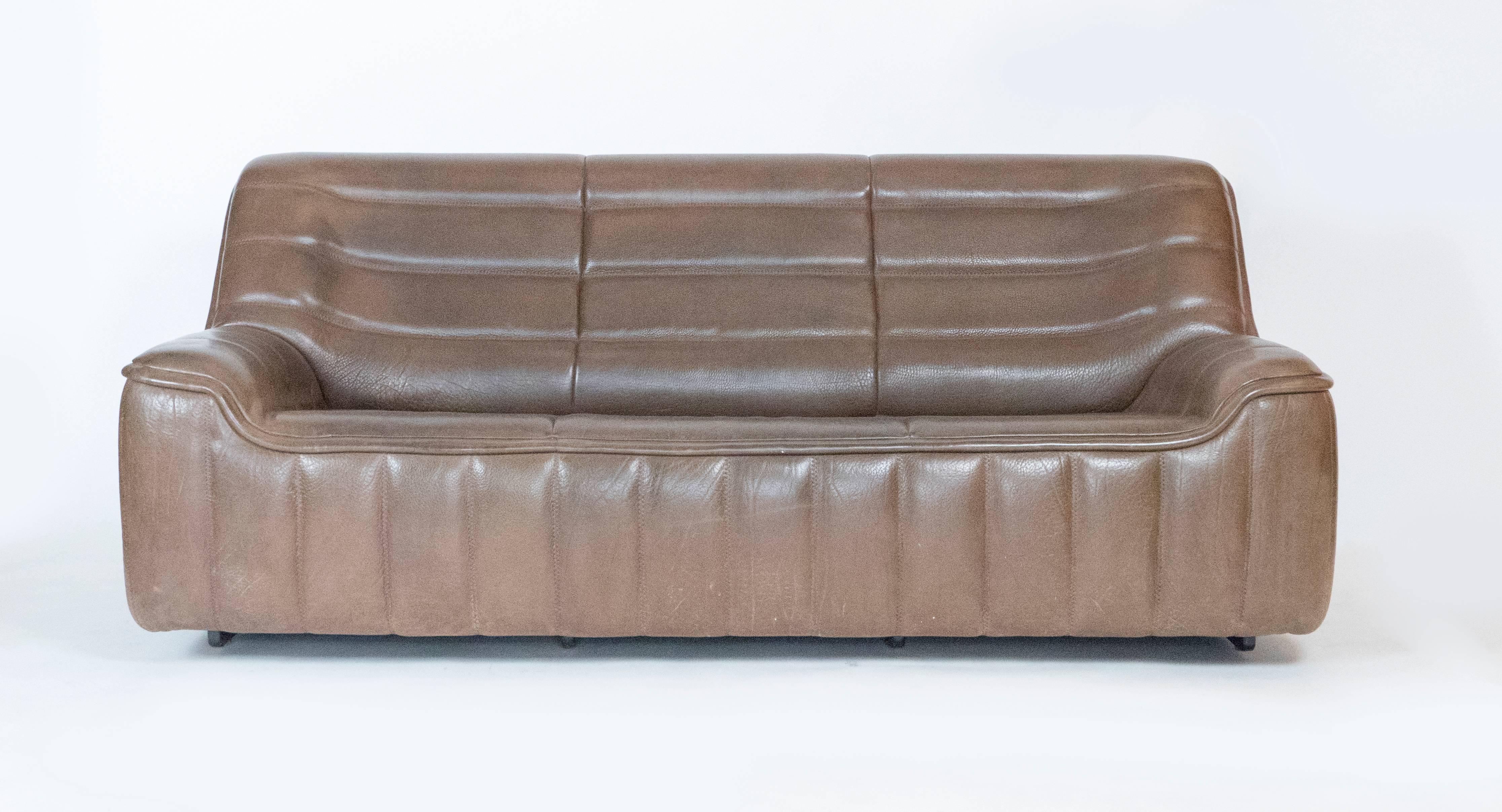 Three-seat leather sofa by De Sede. The couch is in perfect condition. It has a great patina. Very comfortable and rare to find a three-seat of this model.  This sofa is in our space in the Gallery @ 200 Lex. in  NYC.