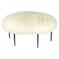 Large Scale Round Ottoman with Leather Wrapped Legs. Mongolian Wool
