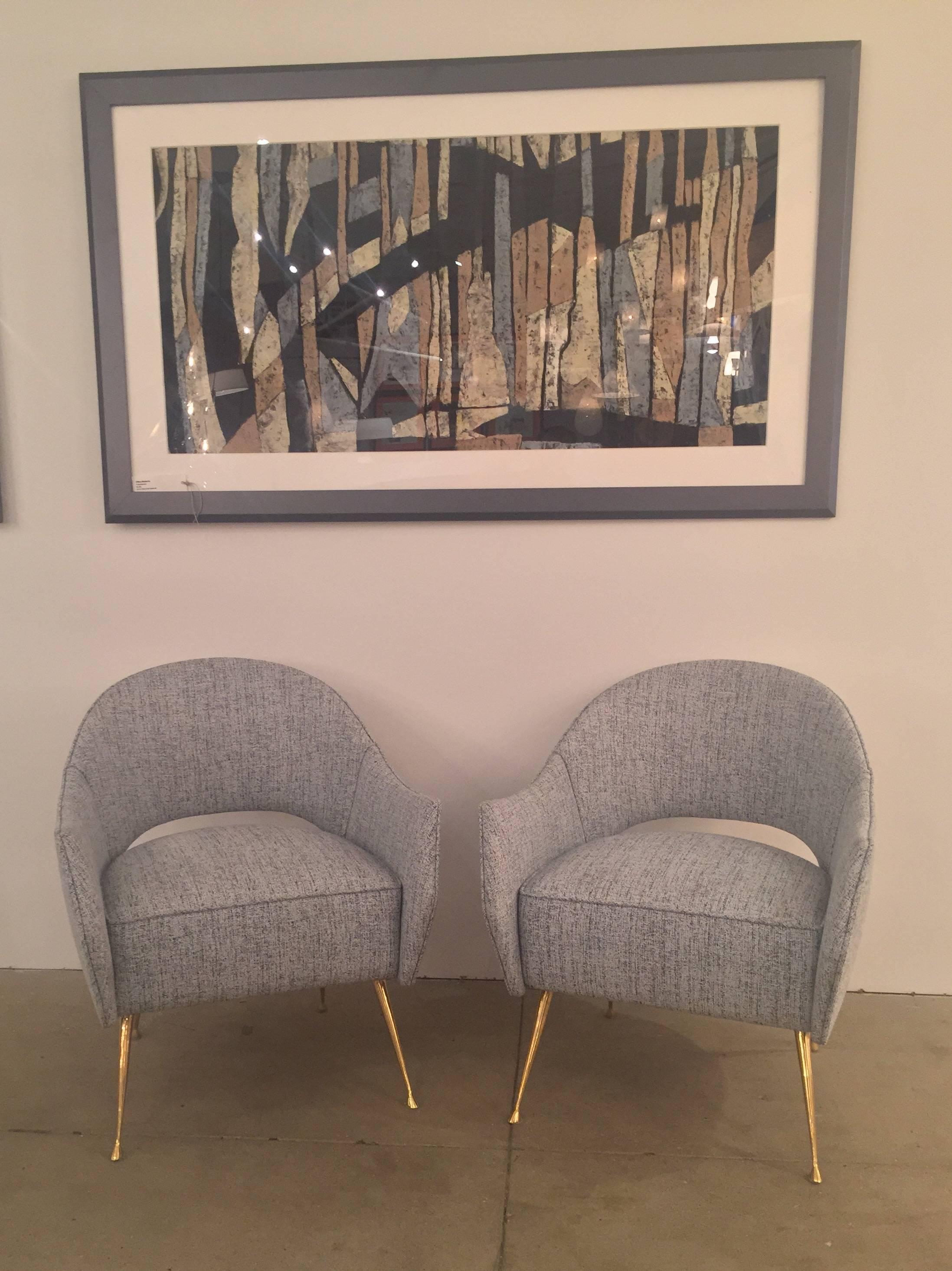 These elegant chairs have cast brass legs and a distinctive curved back. The chair is very comfortable, perfect in size and are ideal as small-scale side chairs.
The beauty of the tapered brass legs with their graceful feet are sure to add that
