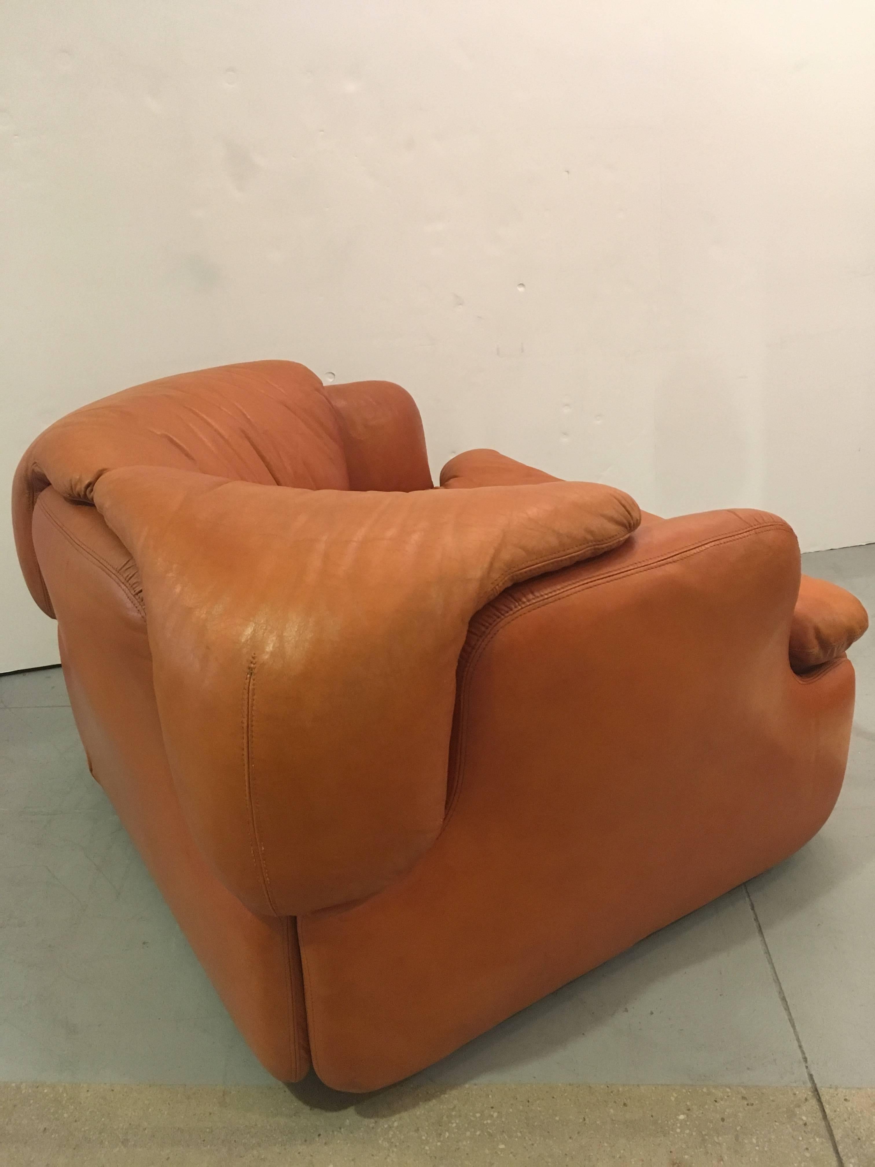 One leather armchair designed by the Alberto Rosselli. The chair is so inviting, so comfortable and in great shape for it age. The unique design of the cushions which nestle in the frame make it a work of art. The leather is in great shape with no