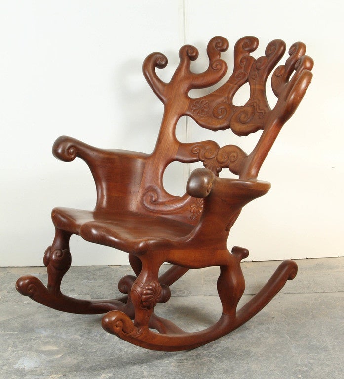 Hand-carved cherry wood rocker, pictured in 