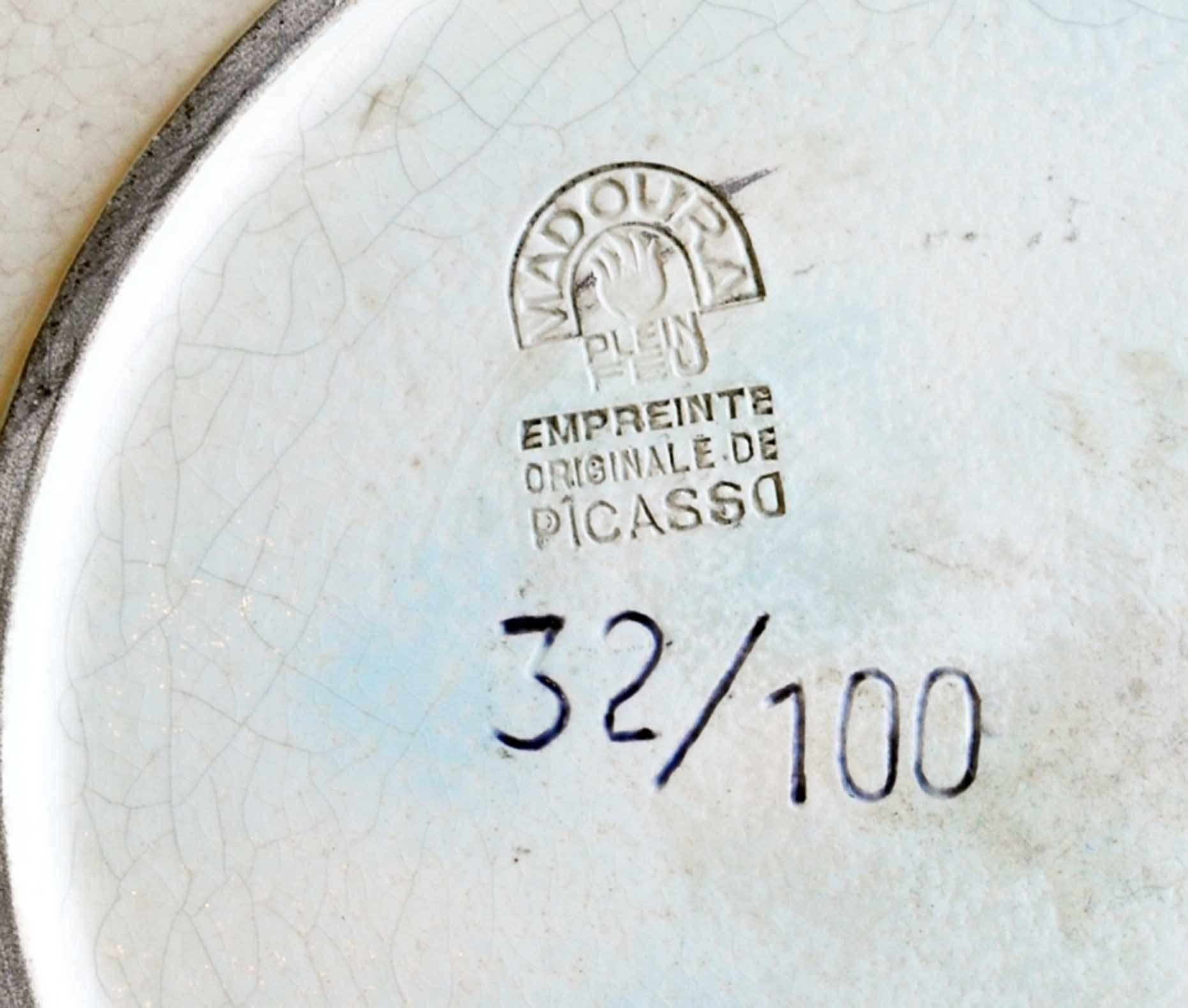 Ceramic plate by Pablo Picasso from his famous bull fighting series. This is number 32 of a small edition of 100. The date on the front is 11/6/59. The back is impresses with: Empreinte, Originale de Picasso, #32/100 Madoura/plein feu.
