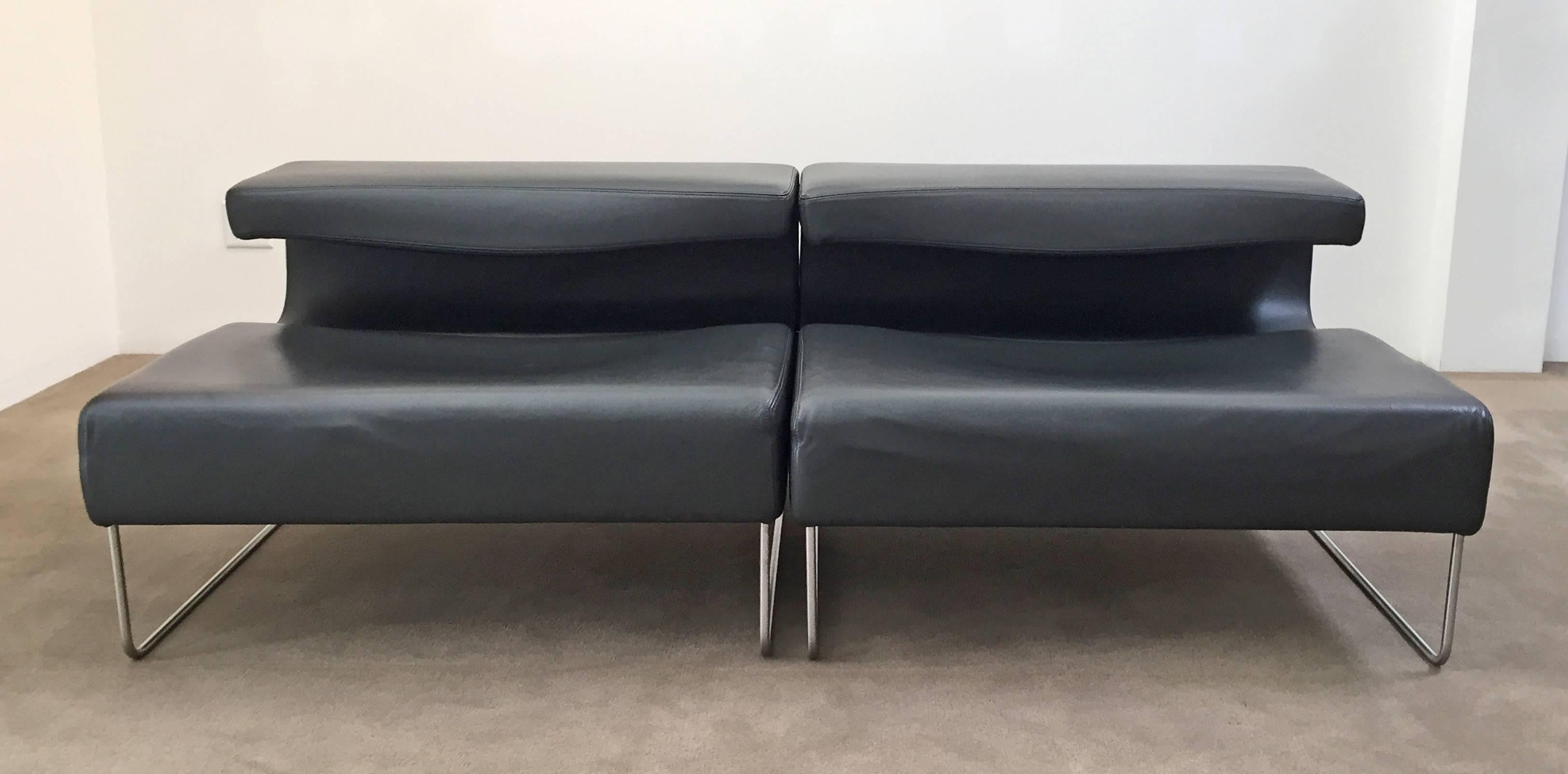 Pair of leather chairs. Made in Italy by Moroso and designed by Patricia Urquiola. Polished steel legs with leather upholstery. Price is for the pair. Ready for use.