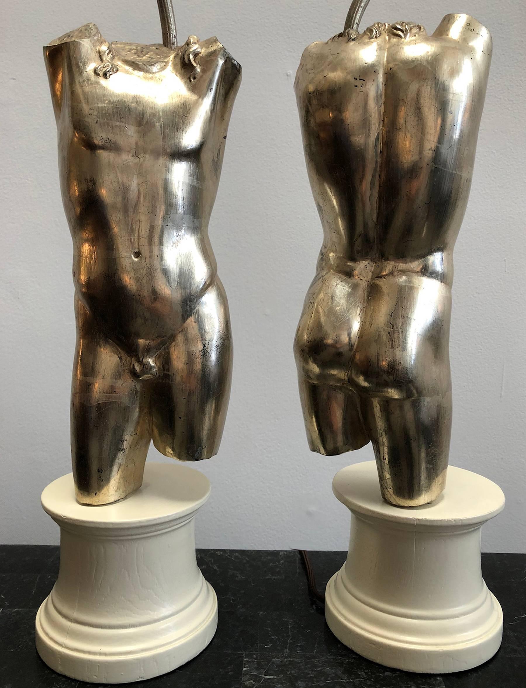 Pair of male torso lamps. Lacquered wood bases. Silver gilt finish. Classic look from the 1960s.

Complementary delivery in the Los Angeles / Beverly Hills area and Pasadena area. Pick up is also an option.
