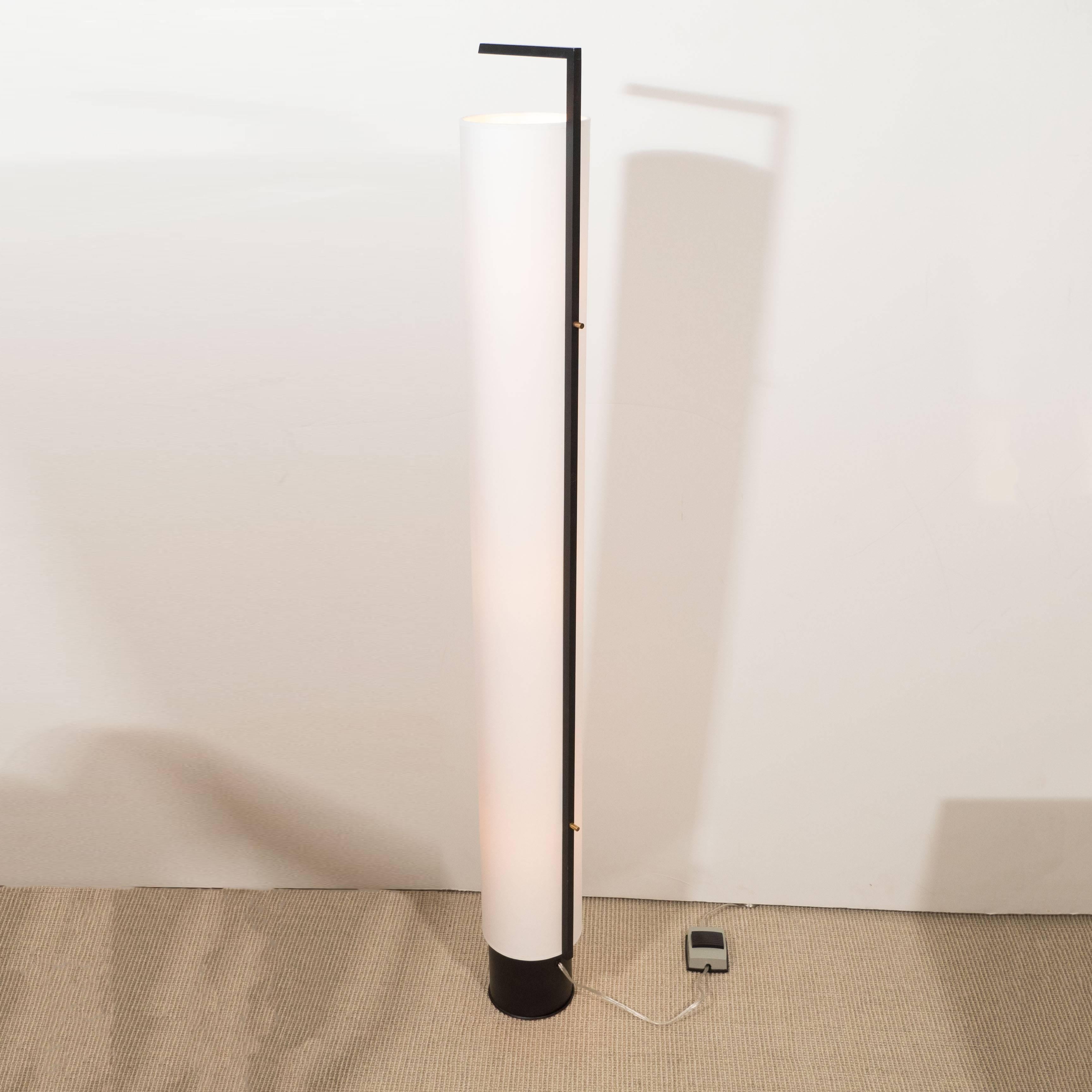 Arlus tall cylindrical lamp with shade.
