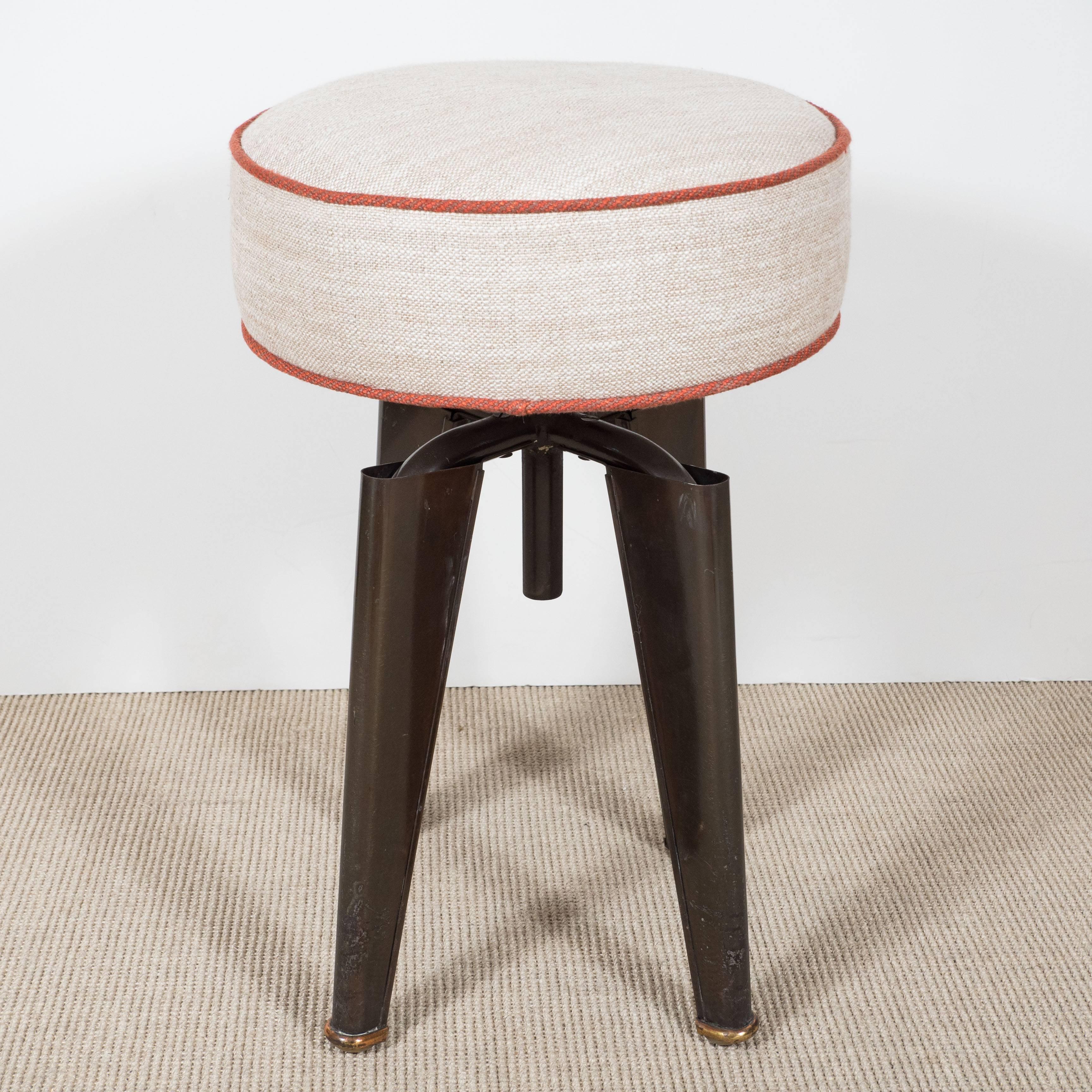 Andre Domin Marcel Geneviere Maison Domin stool round with metal base and gold feet.