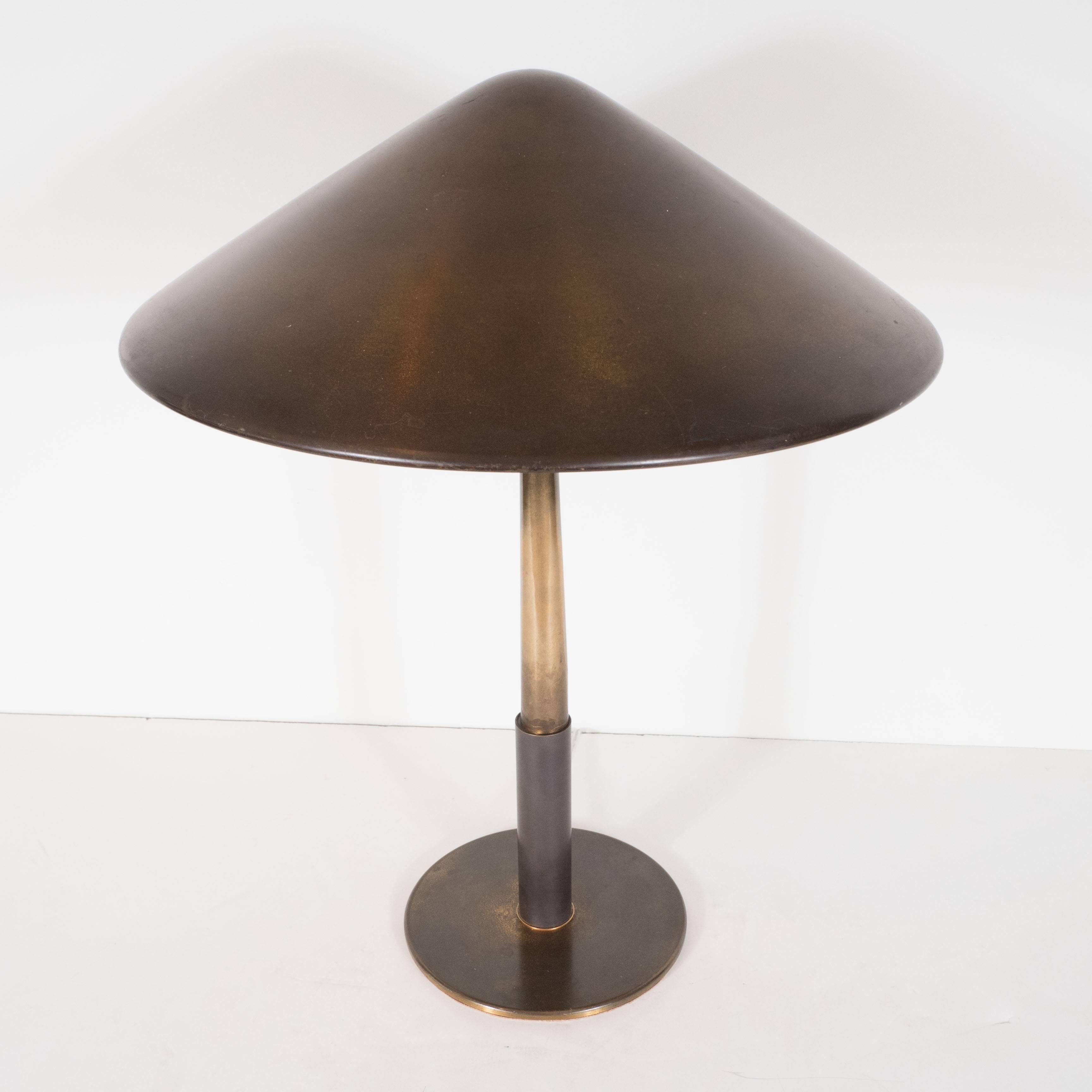 Stilnovo brass table lamp with brass shade, Italy, 1950s.