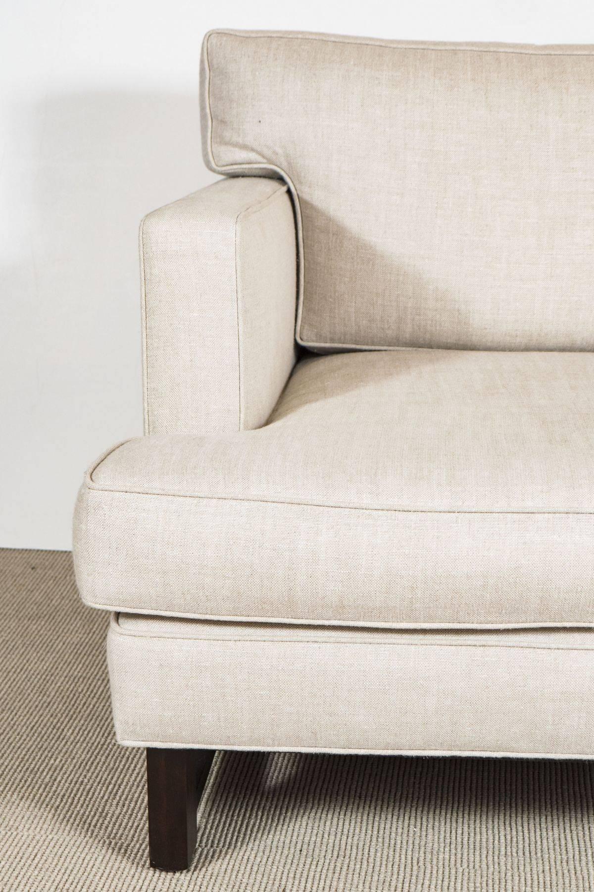 1960s inspired club chair in the manner of Edward Wormley upholstered in light beige Belgian linen, contemporary.