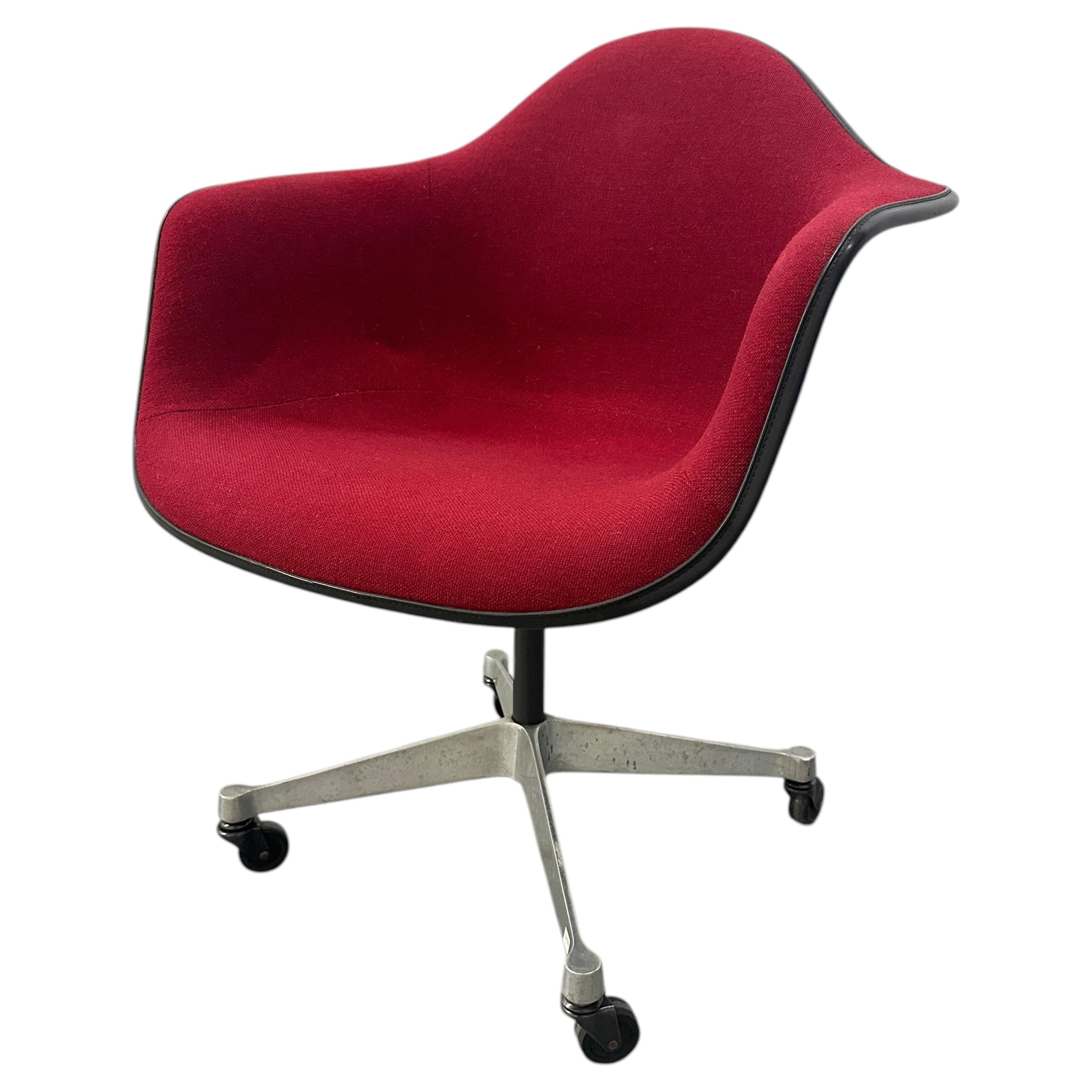 VIntage Red Upholstered Swivel Chair On Wheels By Charles And Ray Eames For Sale